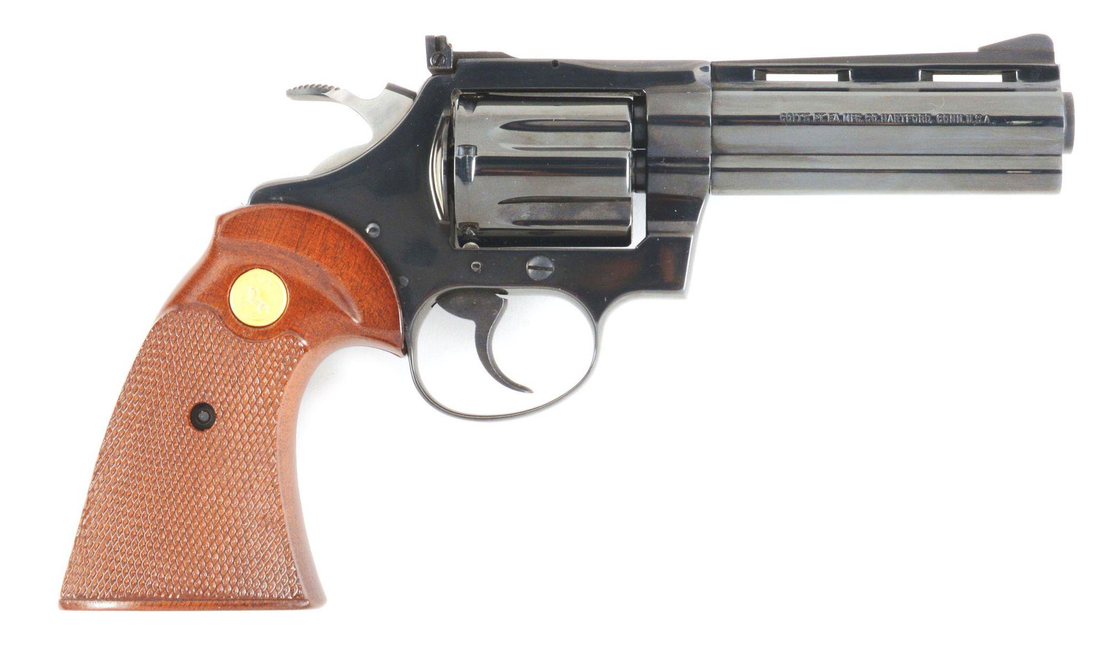 (M) COLT DIAMONDBACK .38 SPECIAL REVOLVER: Colt Diamondback revolver with original box. Serial number dates this gun to 1976. Blued finish with original Colt wood grips. Frame and cylinder match. Spurred hammer. CONDITION: Overall excellent. M