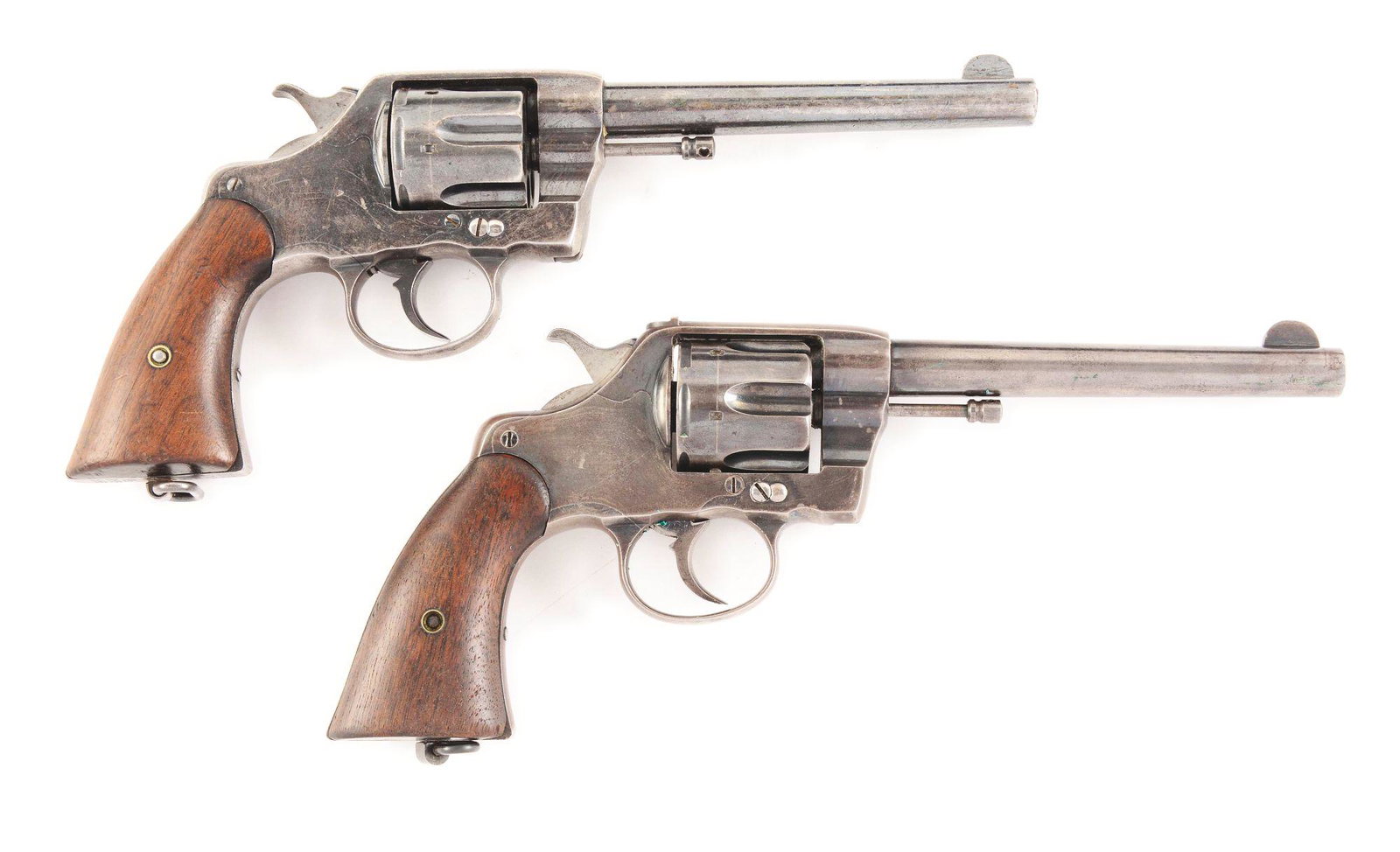 (C) LOT OF TWO COLT 38 ARMY REVOLVERS: MODEL 1896 &: Lot consists of (A) Manufactured 1901. Blue finish with US Army markings on butt with swivel. Caliber .38 with smooth military walnut grips. RAC inspected on frame. Comes in 1910 dated Rock Island Ars