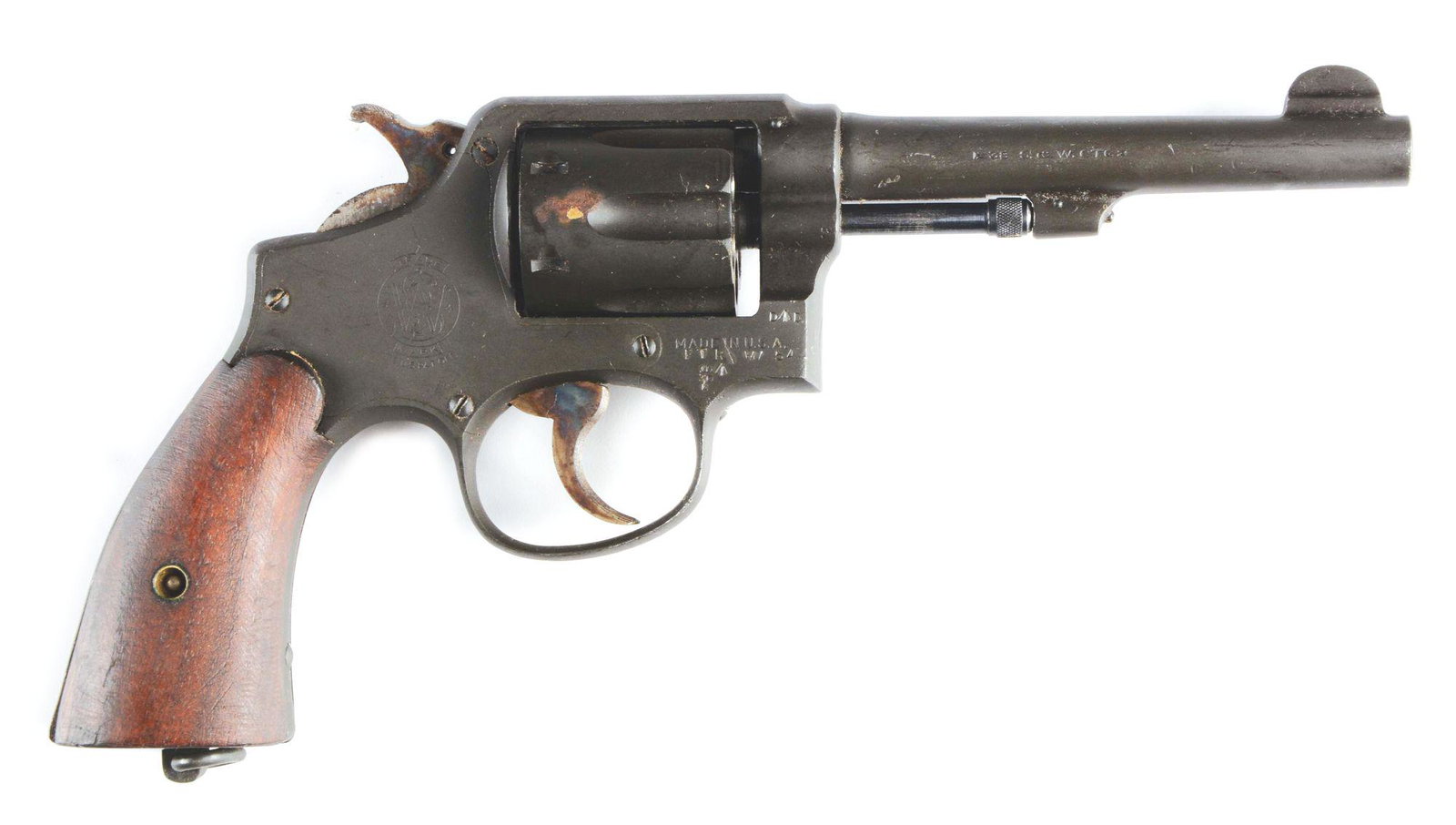 (C) SMITH & WESSON VICTORY REVOLVER.: K-frame, five-screw with 5" pinned barrel, chambered in .38 Smith & Wesson. Lanyard ring on butt. Six-shot fluted cylinder. Sandblasted with "Black Magic" finish. Military inspector stamps in appropri