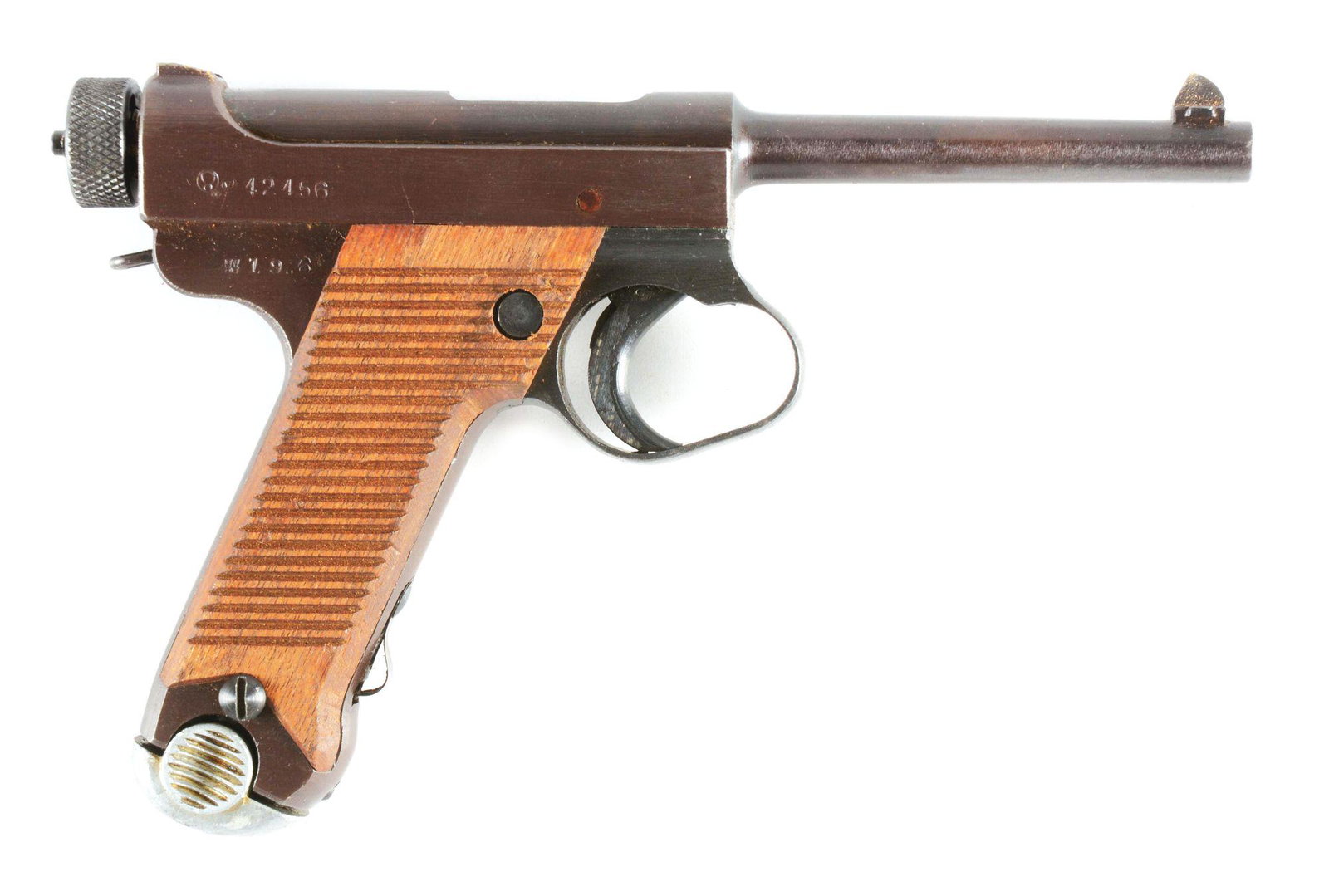 (C) VERY FINE WWII JAPANESE TYPE 14 NAMBU SEMI: Standard configuration. Completely matching throughout, including the magazine. Made in June of 1944 (19.6 date code). Frame, slide and barrel feature a late war plum style finish. Accompanied by a ru