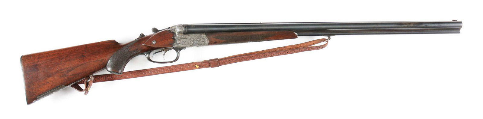 (C) HIGH GRADE EMIL KERNER & SOHN DRILLING.: Interesting higher grade drilling with 7.8x57 rifle caliber on the bottom of two 16 bore barrels. Top rib is matted with flip up rear sight. Scalloped action boxlock with side clips is near full cover