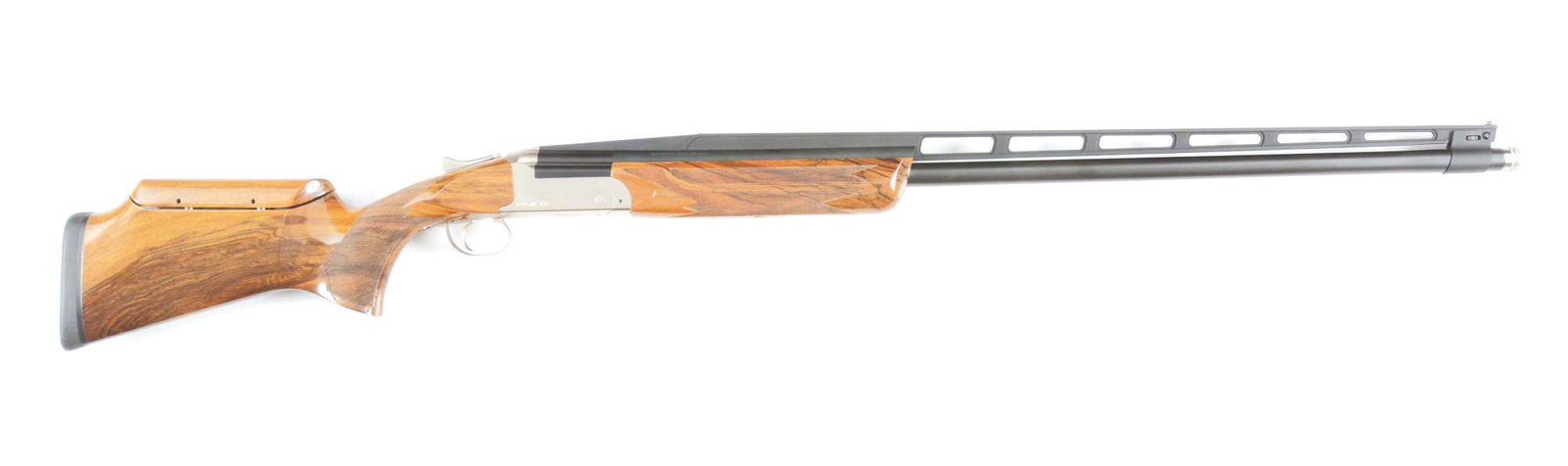 (M) KOLAR T/S SINGLE SHOT 12 GAUGE SHOTGUN.: Kolar model T/S, state of the art trap shotgun. Adjustable rib and comb. 34" single barrel. Comes with 3 screw in choke tubes. Full figured checkered walnut stock and forearm. Matt finish stainless fr