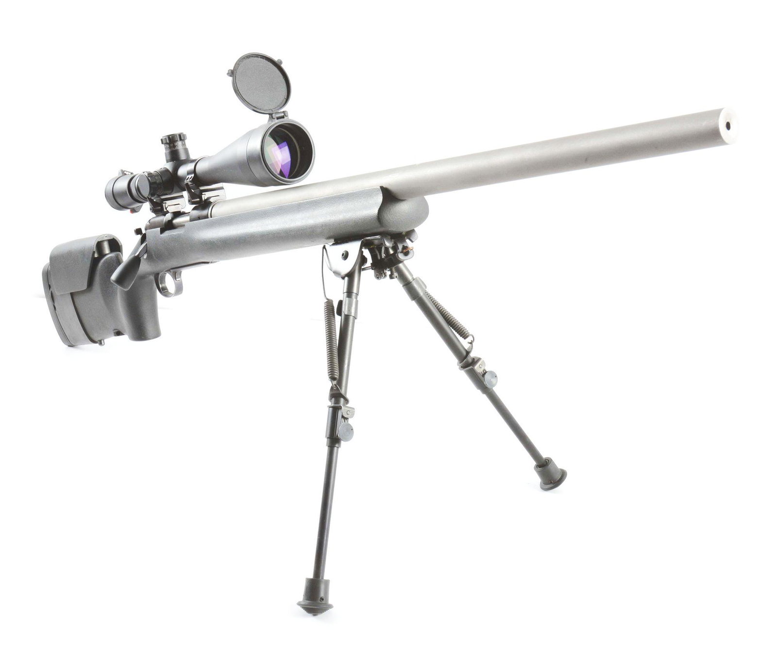 (M) REMINGTON 40X BOLT ACTION .223 RIFLE WITH LEUPOLD: Remington 40X action, Remington barrel, integral box feed, oversized bolt knob. Unmarked polymer stock with palm swell pistol grip, adjustable comb, H-S Precision black recoil pad, pillar bedding, Har