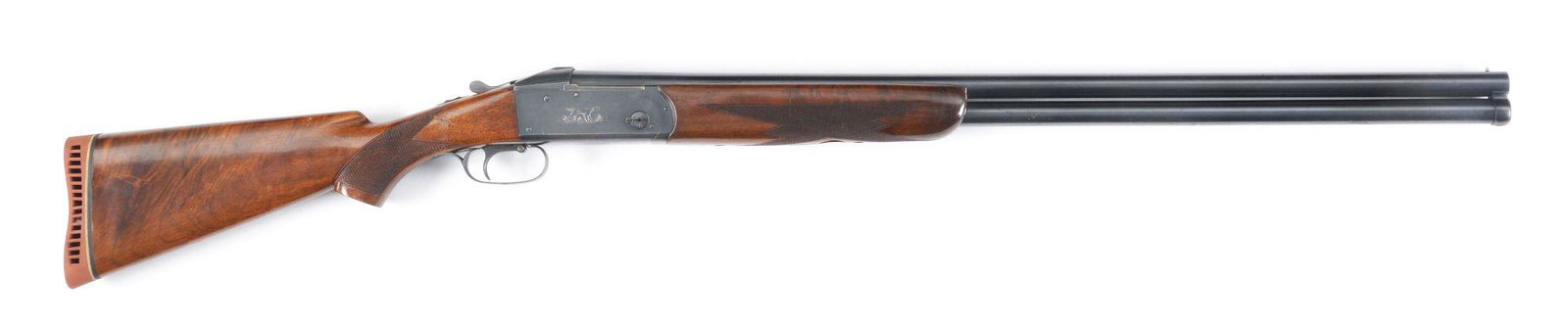 (C) REMINGTON 32 OVER/UNDER SHOTGUN.: 30" Barrels without rib have factory markings on top, gauge on left. Blued action with sliding locking shroud features single selective trigger and automatic safety. Sides of action are decorated with