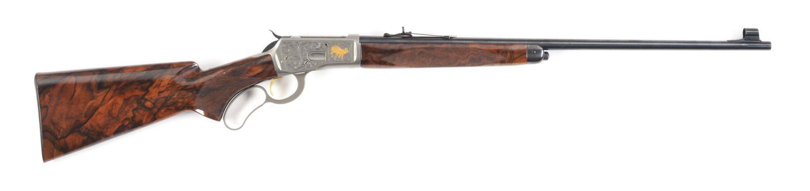 (M) BROWNING MODEL 65 .218 BEE LEVER-ACTION RIFLE.: High Grade Model 65 with "French Grayed" frame. Scroll engraved by T. Naka, featuring a gold inlaid coyote on the left side of the frame and a gold inlaid bobcat on the right side. Full figured, check