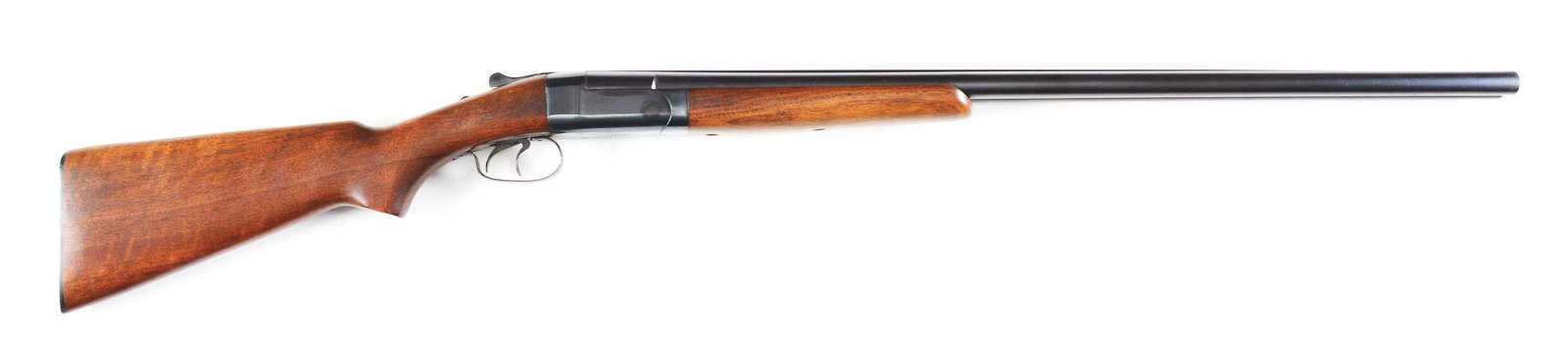 (C) WINCHESTER MODEL 24 SIDE BY SIDE SHOTGUN.: Boxlock with 30" barrels, slightly raised grooved rib, round brass front bead sight and extractors. Black receiver with double triggers, auto safe. Non checkered walnut stock with black Winchester but