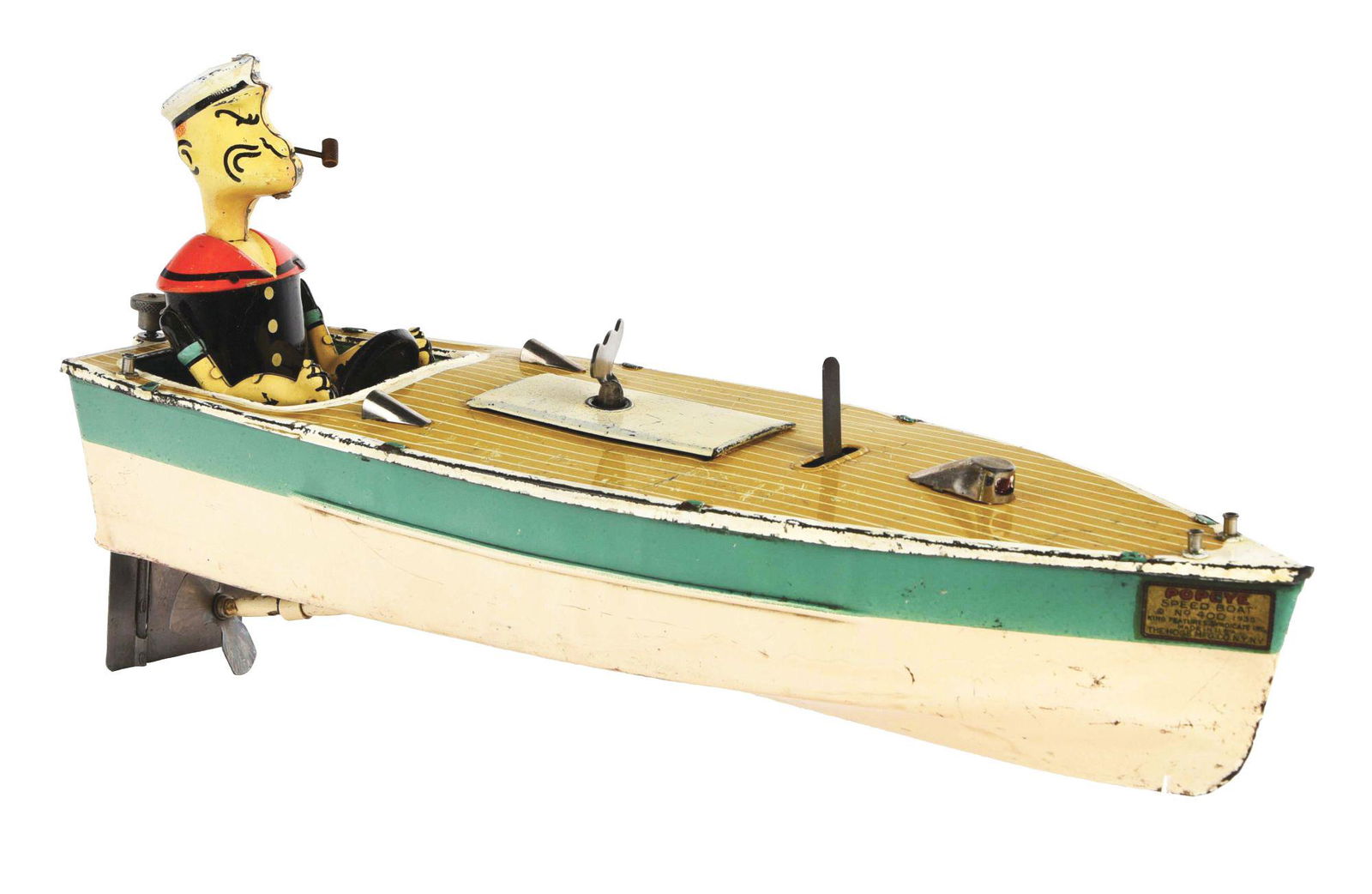 RARE HOGE NO. 400 POPEYE CLOCKWORK SPEEDBOAT TOY.: Circa 1935. Label on front of boat says "King Features Syndicate The Hoge Mfg. Co. New York, New York". Toy depicts Popeye with original pipe sitting in back of boat, steering speedboat. Looks to be o