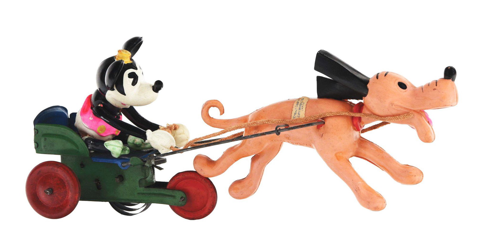 JAPANESE PRE-WAR WALT DISNEY CELLULOID MINNIE MOUSE IN: Circa 1930's. Celluloid figures of Minnie Mouse in tin cart with tin wheels pulled bu celluloid Pluto. Pluto still has inspection sticker on one side and "Walt Disney Enterprises Ltd. Japan" on other.