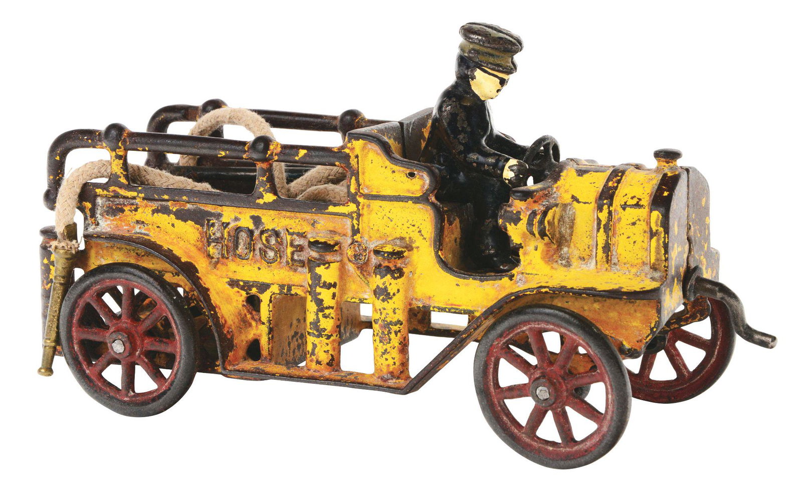RARE CAST-IRON KENTON HOSE REEL TRUCK.: Embossed "Hose" on both sides of rear. Crank in front, original driver, hose is with original nozzles, spoke wheels and includes inside bed hanger. A very elaborate and intricate truck. CONDITION: Mod