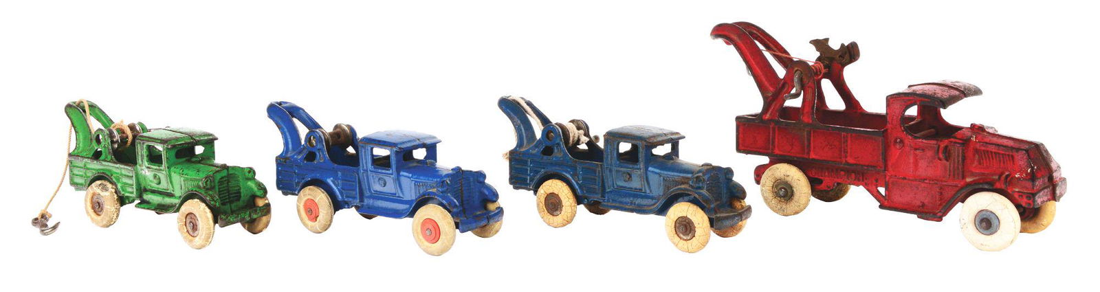 LOT OF 4: CAST-IRON AMERICAN MADE TOW TRUCKS. (1 of 3)