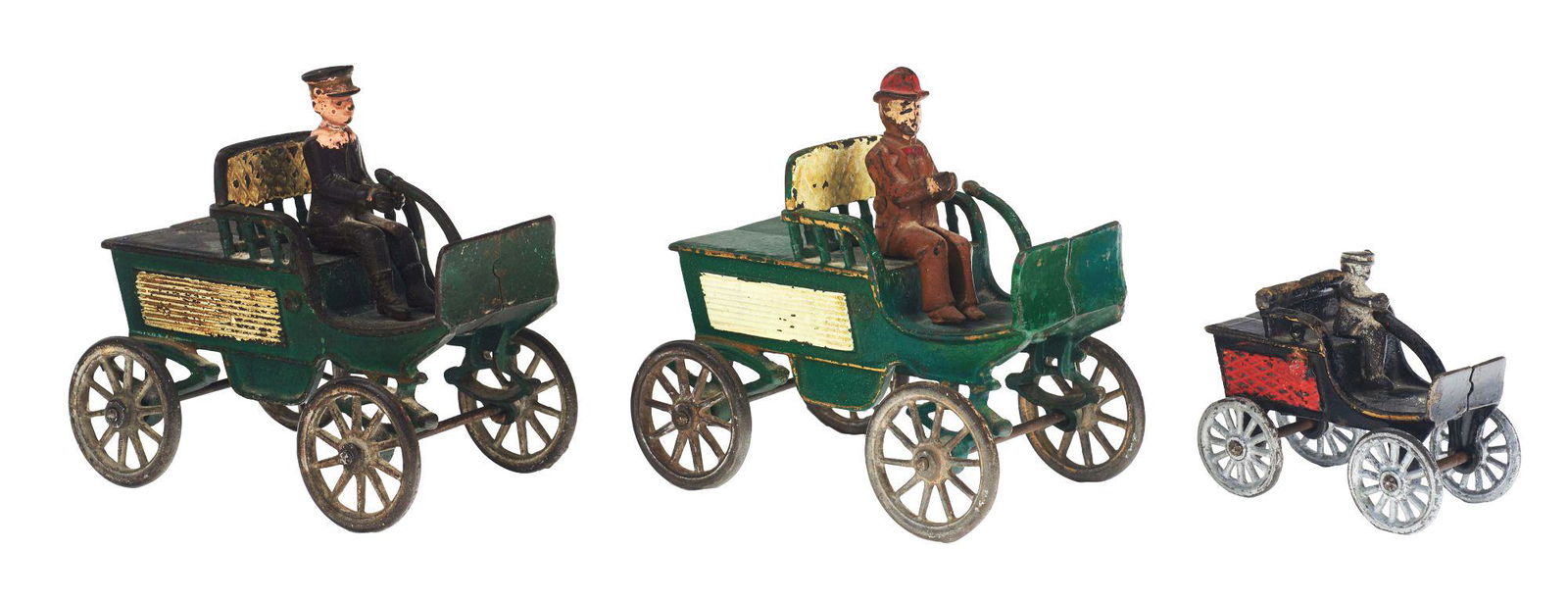 LOT OF THREE CAST IRON HARRIS HORSELESS CARRIAGES. (1 of 2)