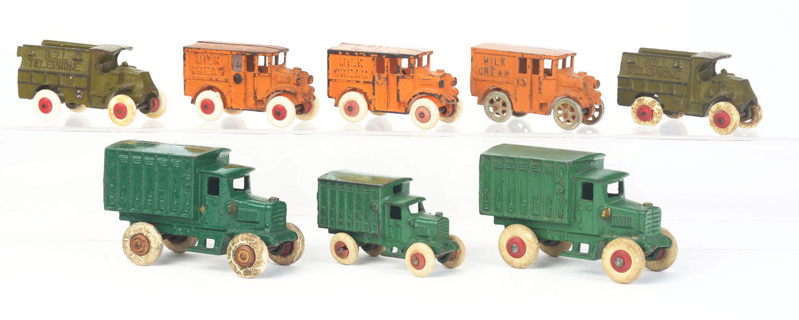 LOT OF 8: CAST-IRON HUBLEY TRUCKS. (1 of 2)