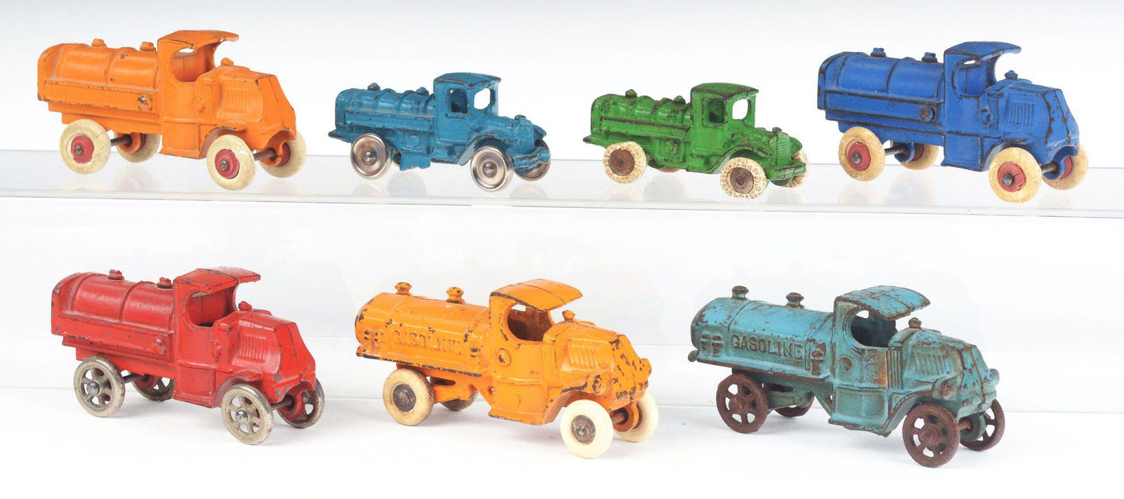 LOT OF 7: AMERICAN MADE CAST-IRON GASOLINE TRUCKS. (1 of 2)