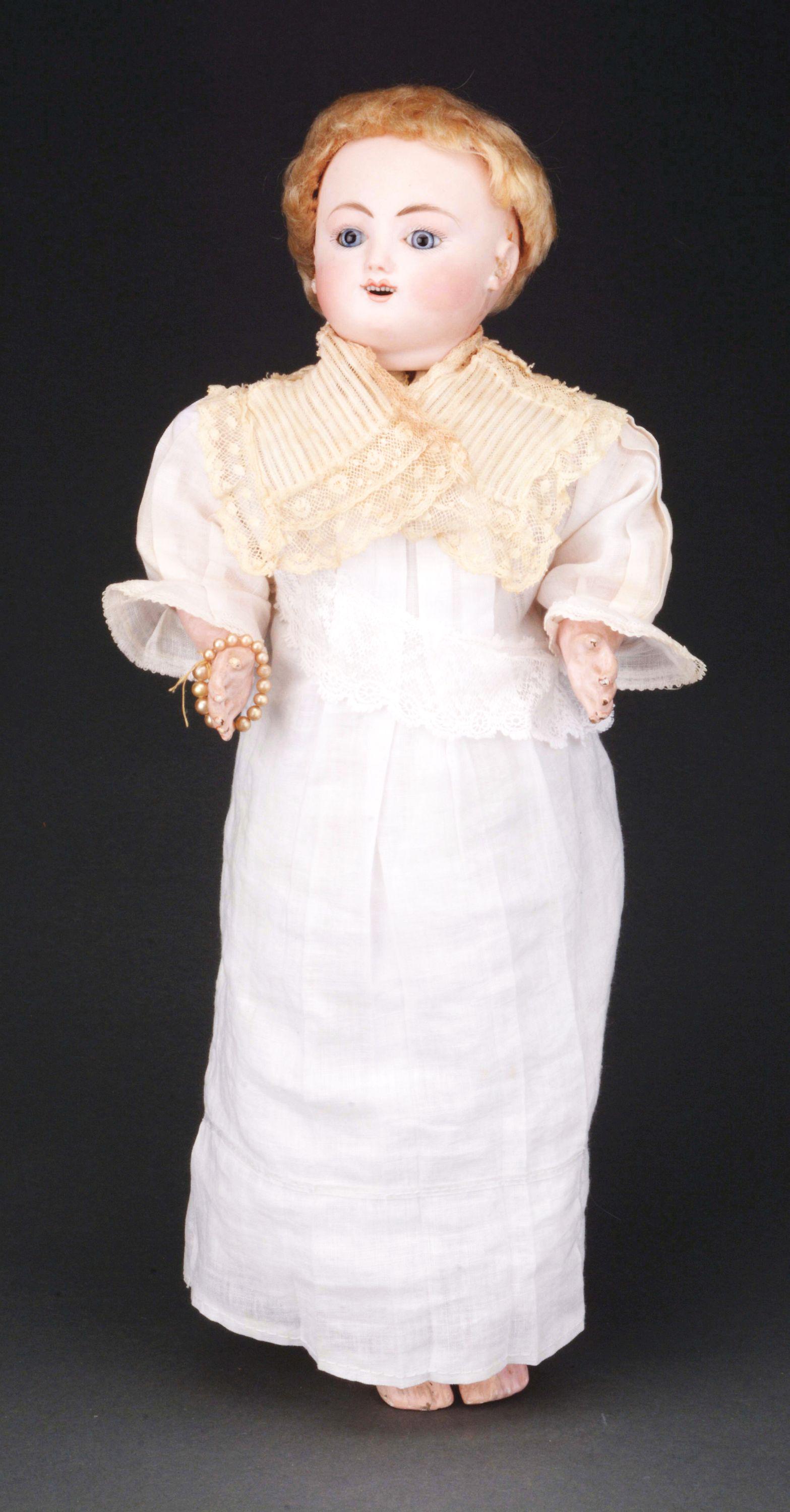 STEINER BEBE GIGOTEUR.: Attractive walking-talking Steiner in slightly smaller than usual size, 17 - 1/2", with pale solid dome bisque head with flange neck, pale blue glass eyes, open mouth with two rows of tiny little teet
