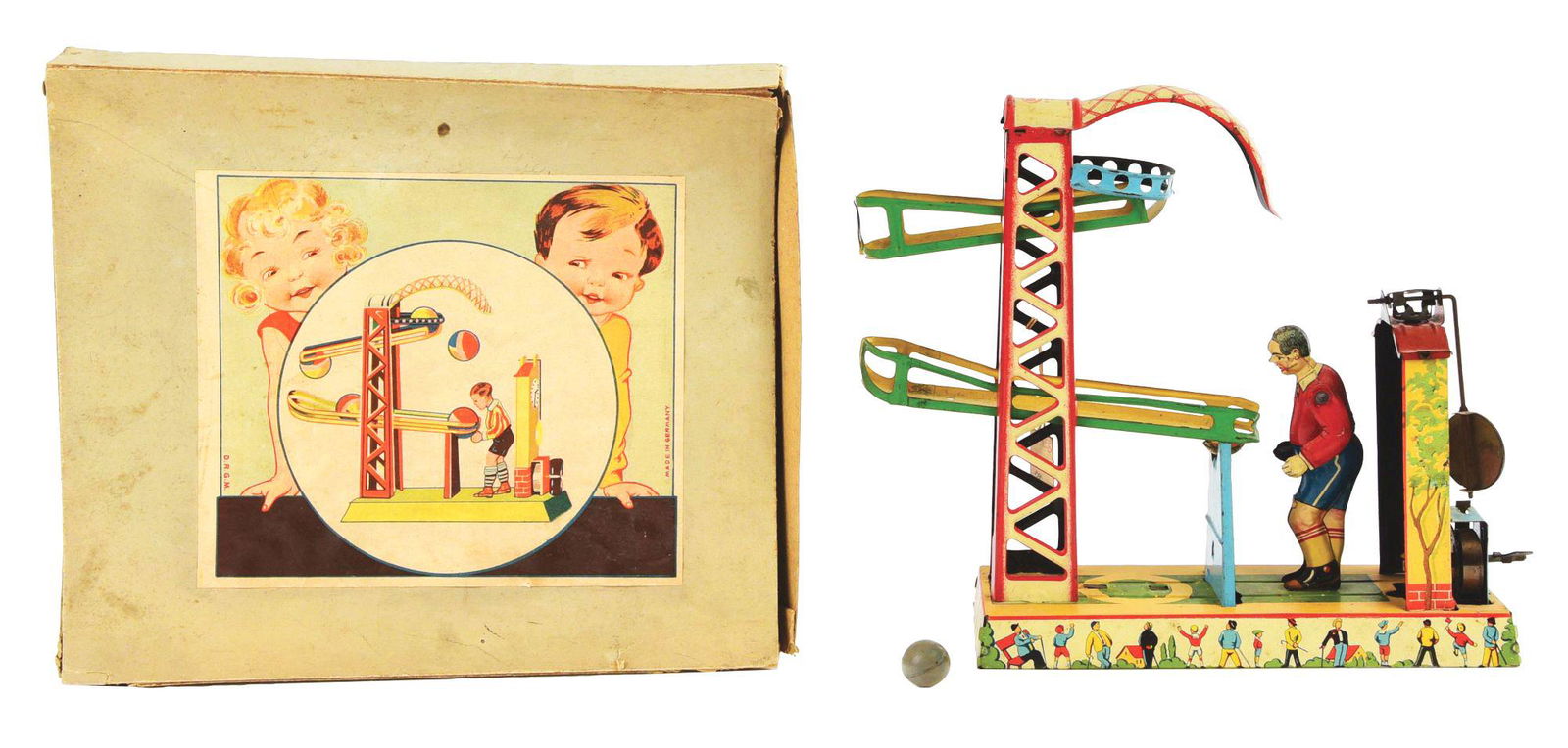 GERMAN TIN-LITHO WIND-UP BALL PLAYING TOY. (1 of 4)