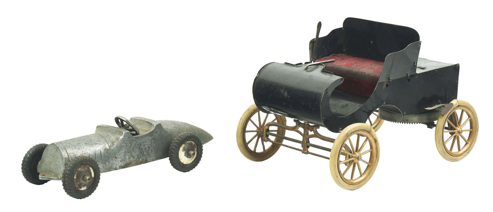LOT OF 2: AMERICAN MADE PRESSED STEEL AND DIE-CAST: First is an early Acme wind-up curved dashboard circa 1905 with unusual crank mechanism in back with actual mechanism underneath. Second is a die-cast race car, all die-cast with original steering whe