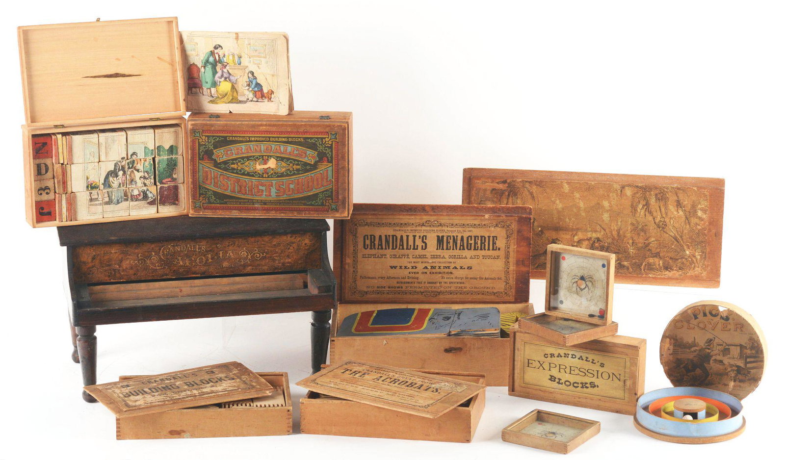 IMPRESSIVE COLLECTION OF ADVERTISEMENTS AND TOYS FROM: Originally displayed in a small museum in Pennsylvania, where Crandall was from. He was a toy inventor and innovator in the mid to late 19th century. This is an impressive collection of eight various 