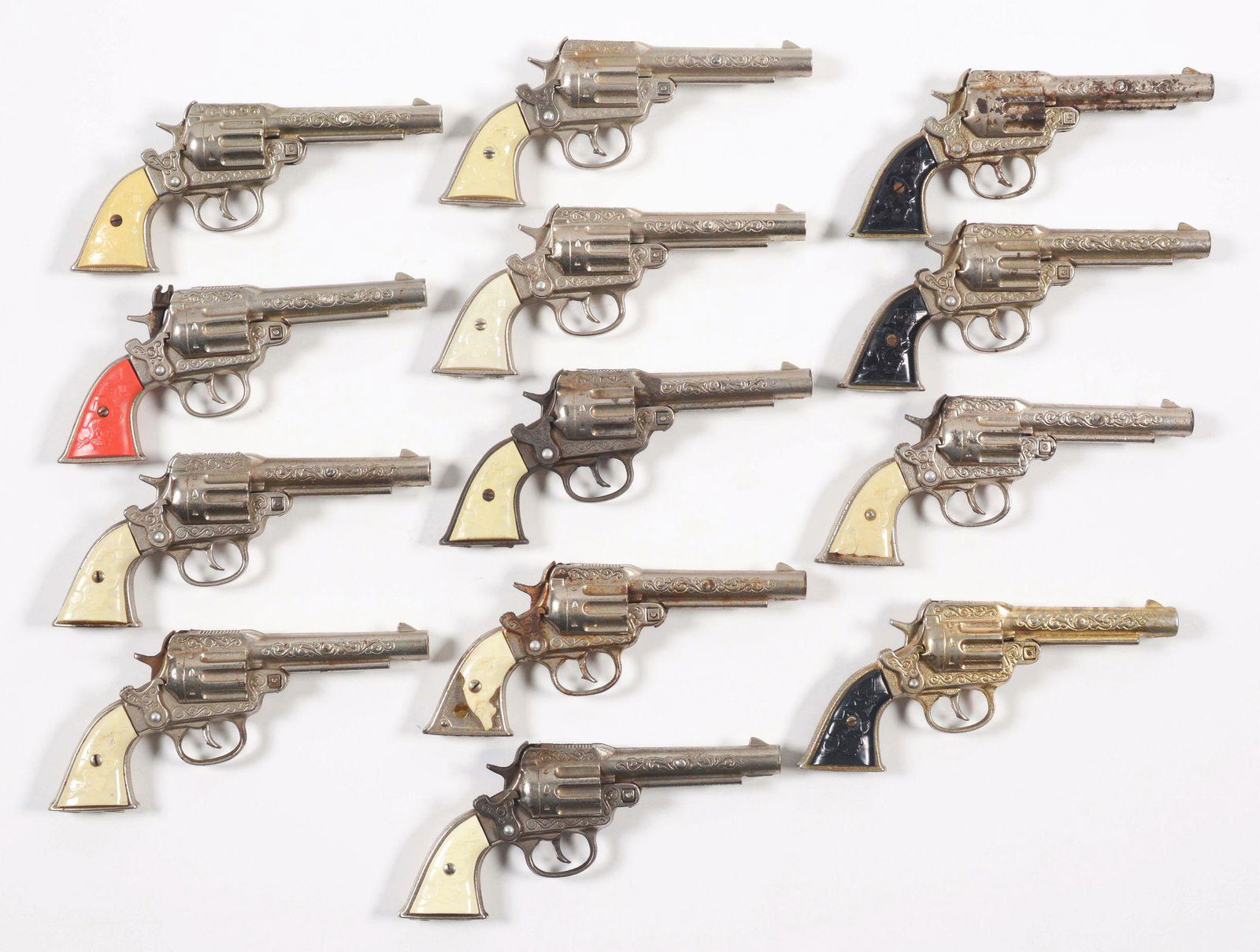 LOT OF 13 VARIOUS DIFFERENT PEACEMAKER CAP PISTOLS. (1 of 1)