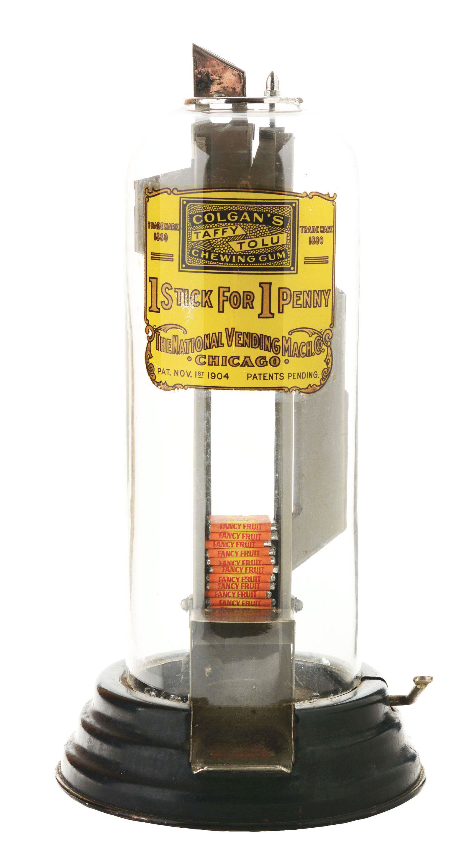 1¢ NATIONAL VENDING MACHINE CO. COLGAN'S TAFFY TOLU: A very desirable glass-domed vending machine by the National Vending Machine Co. to sell Colgan's Taffy Tolu chewing gum. This machine is in near mint condition, the glass globe has no chips or cracks