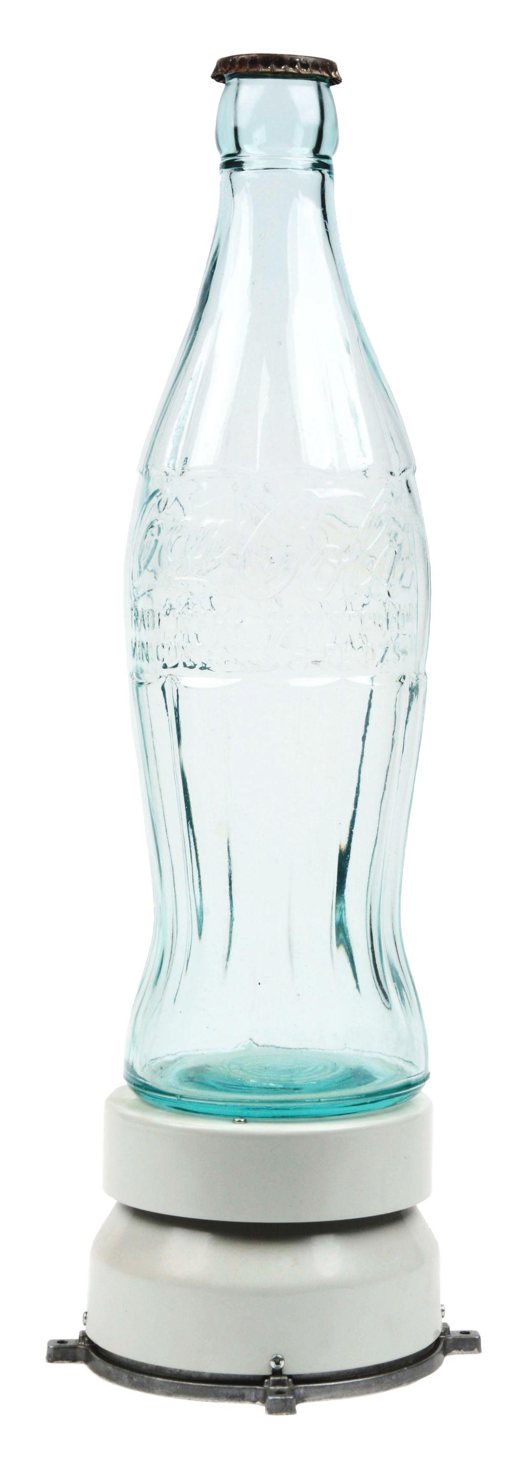 COCA-COLA GLASS BOTTLE WITH ROTATING STAND. (1 of 7)