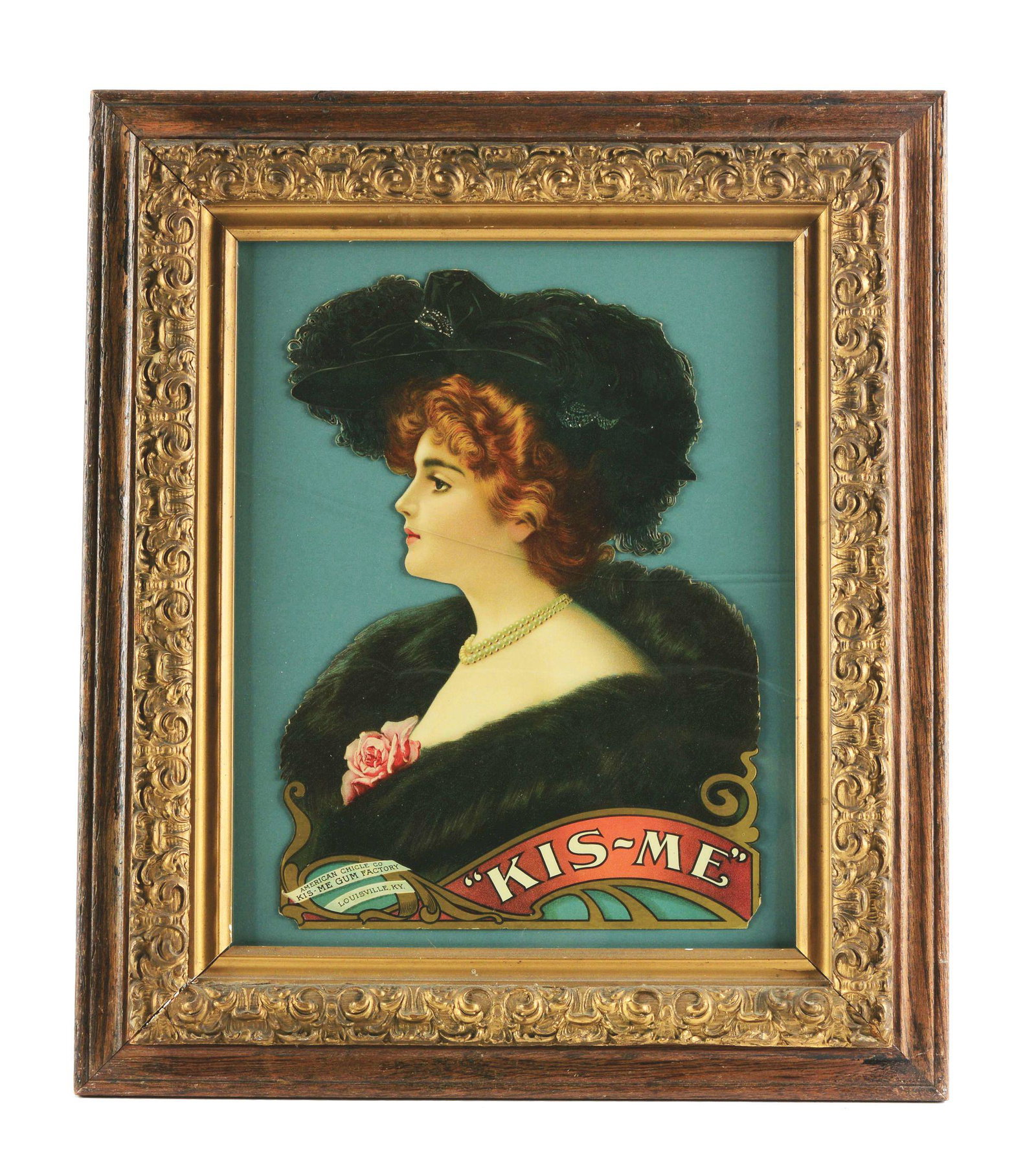 KIS-ME GUM DIE-CUT ADVERTISEMENT.: Kis-Me Gum die-cut in an original old frame. Great colors showing image of pretty girl, labeled "American Chicle Company, Kis-Me Gum Factory, Louisville, Kentucky". Photo of reverse side of piece show