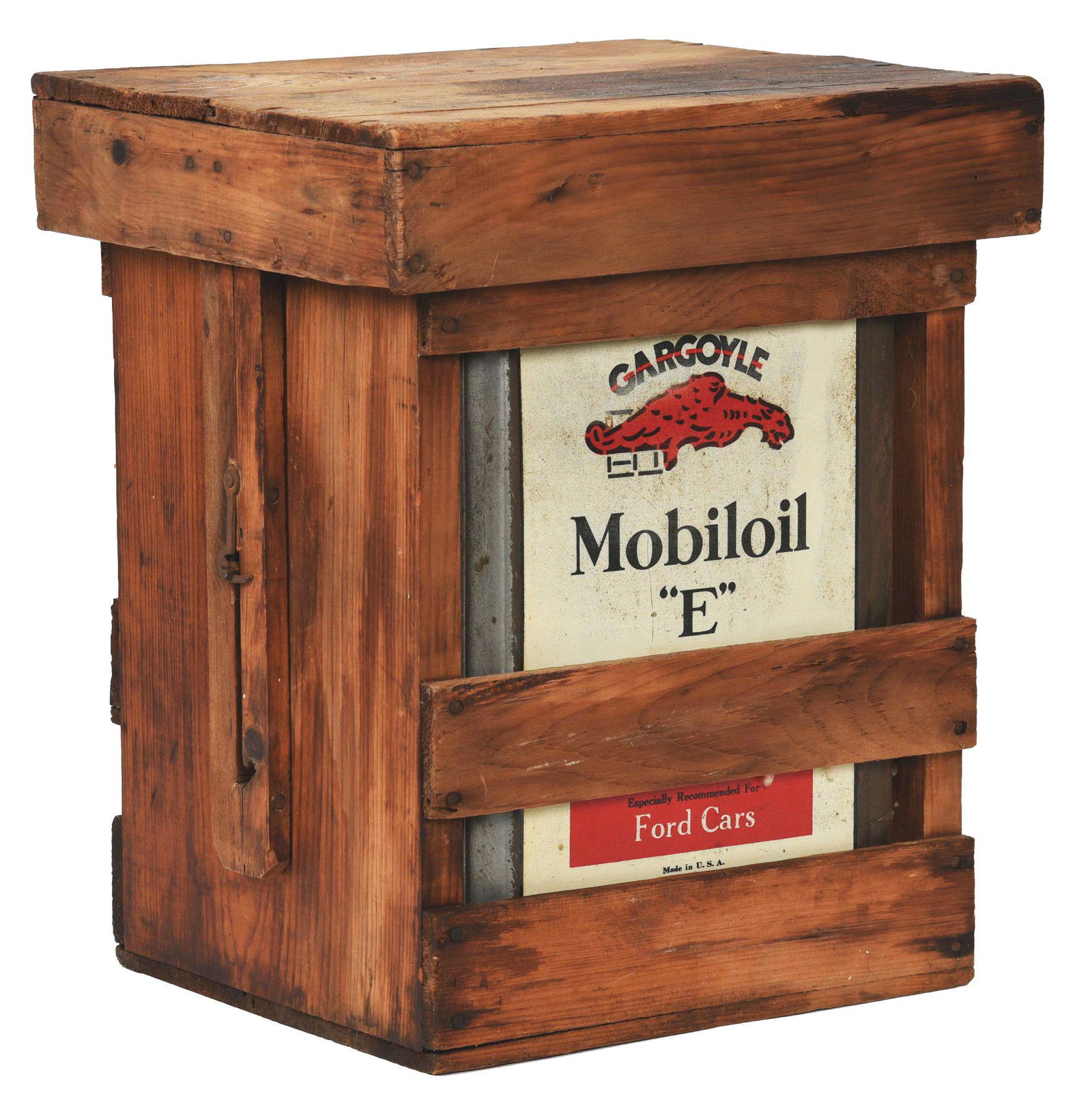 GARGOYLE MOBILOIL E FOR FORDS FIVE GALLON SQUARE CAN IN: Five Gallon Square Can for Mobiloil. Can is in fair condition, showing good color and a clean graphic, with areas of surface scratch and rust areas on each side. Can is mounted in a wooden Novelty Can