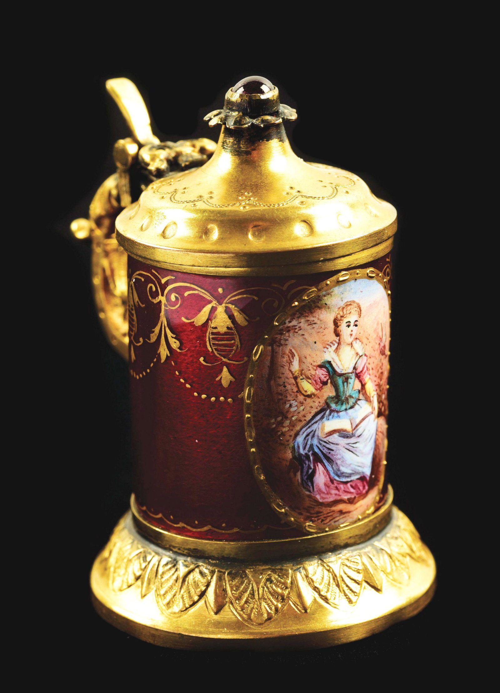 RARE ENAMELED MINIATURE STEIN VINAIGRETTE.: c. 1870. Enamel work of lady with bird. 2" tall. No damage or loss to enamel work, slight bend to stein bottom. Condition: (Excellent). Dimensions: 2 - 1/4” x 2” x 1 - 1/2”.