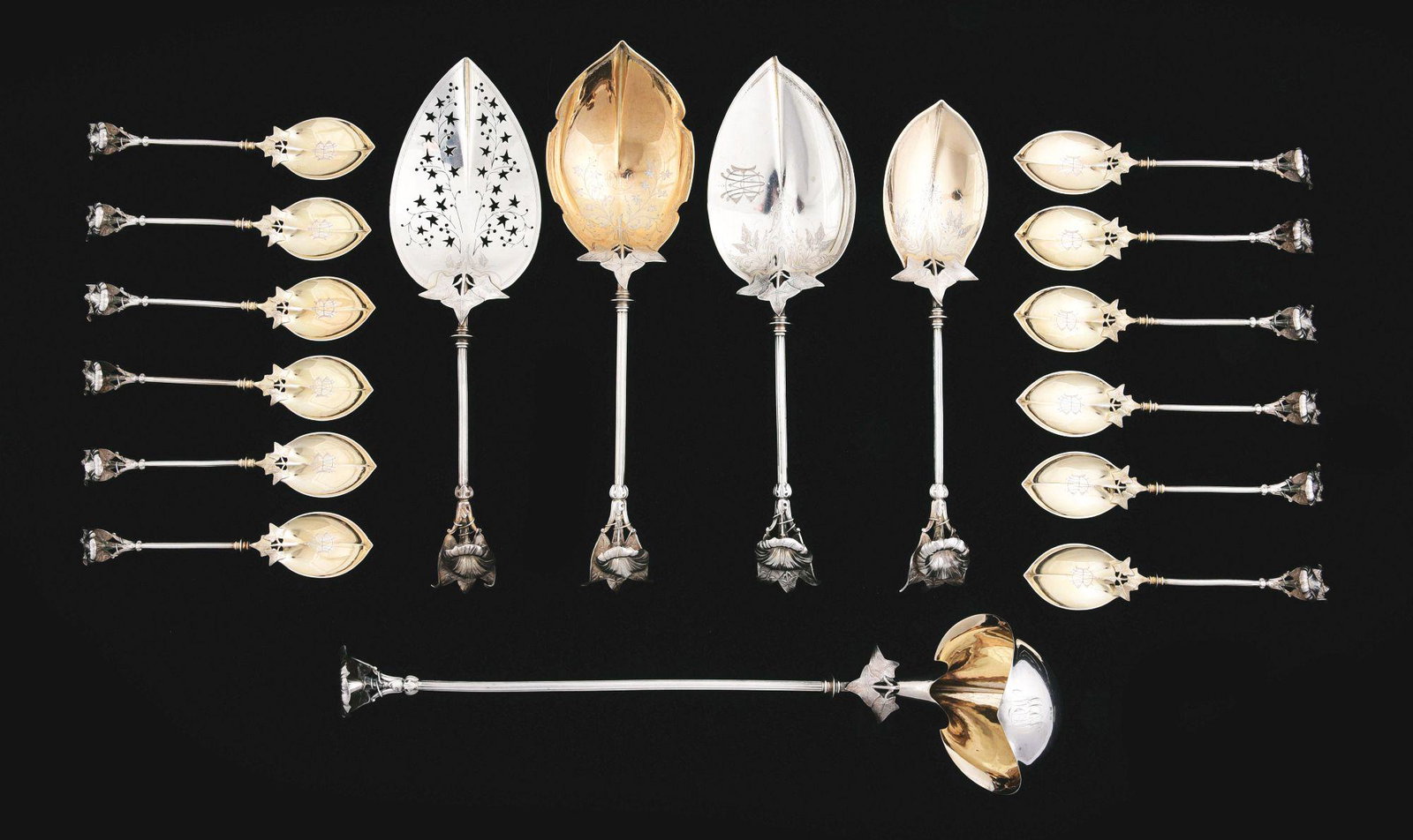 A GROUP OF GORHAM STERLING FLATWARE.: Morning Glory pattern, including a set of 12 ice cream spoons; two serving spoons, the smaller with a ridged bowl; two bladed servers, one with piercing; and a punch ladle with a shaped bowl. Length o