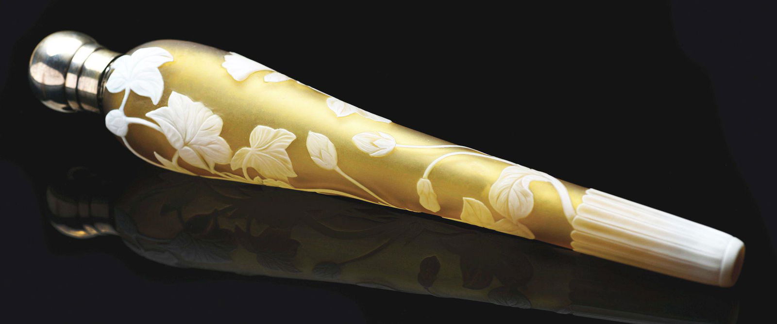 THOMAS WEBB CAMEO GLASS ENGLISH PERFUME BOTTLE.: 11" long with floral design and screw cap marked "S. M." for Sam Morden, with hallmarks. Impressive size and workmanship. No damages, repairs, cracks or scratches. Condition: (Excellent). Dimensions: