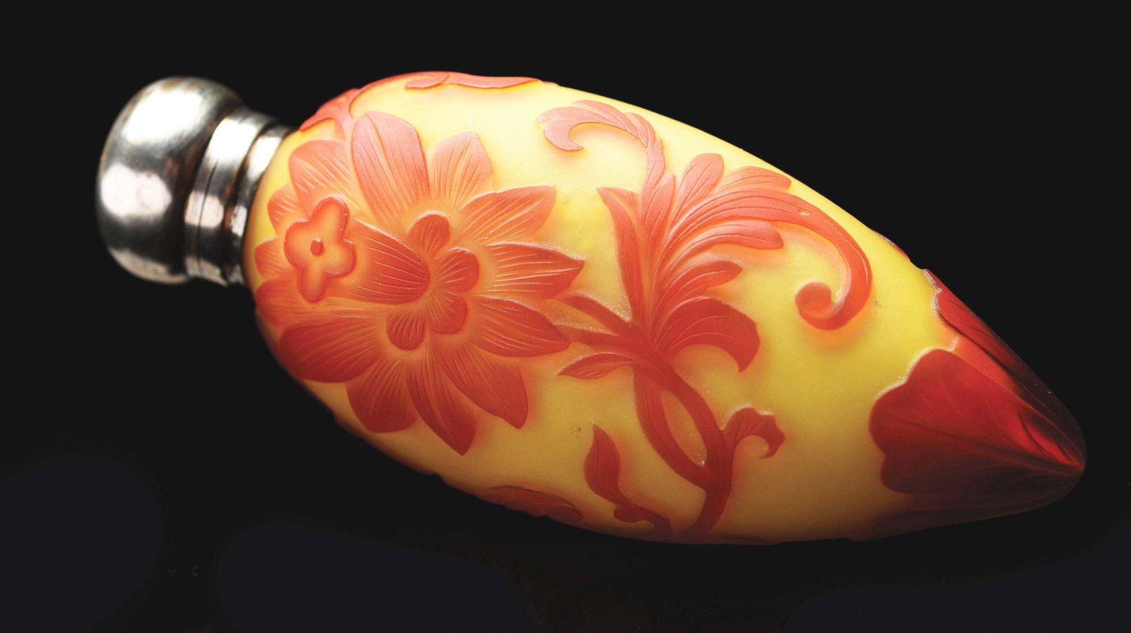 THOMAS WEBB CAMEO ENGLISH PERFUME BOTTLE.: 3 - 3/4" tall with glass stopper. Yellow background with cut red floral design. No damage, repairs, scratches or cracks. Condition: (Excellent). Dimensions: 3 - 3/4" x 1 - 1/2" x 1 - 1/4".