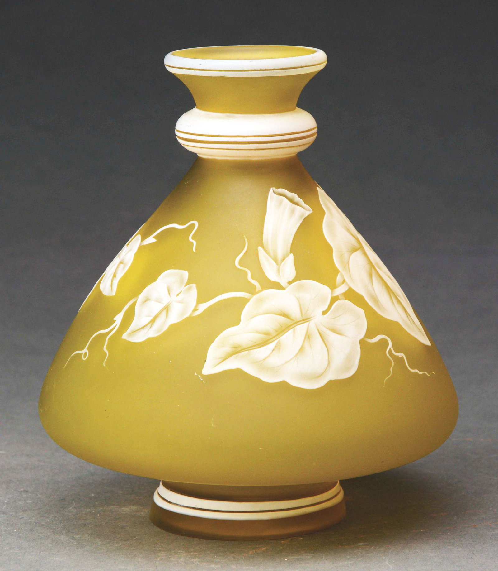 STEVENS AND WILLIAMS CAMEO VASE.: Stevens and Williams vase has beautifully detailed cameo flowers, stems and leaves encircling the body of the vase against a frosted yellow background. Vase is further decorated at the lip, neck and f