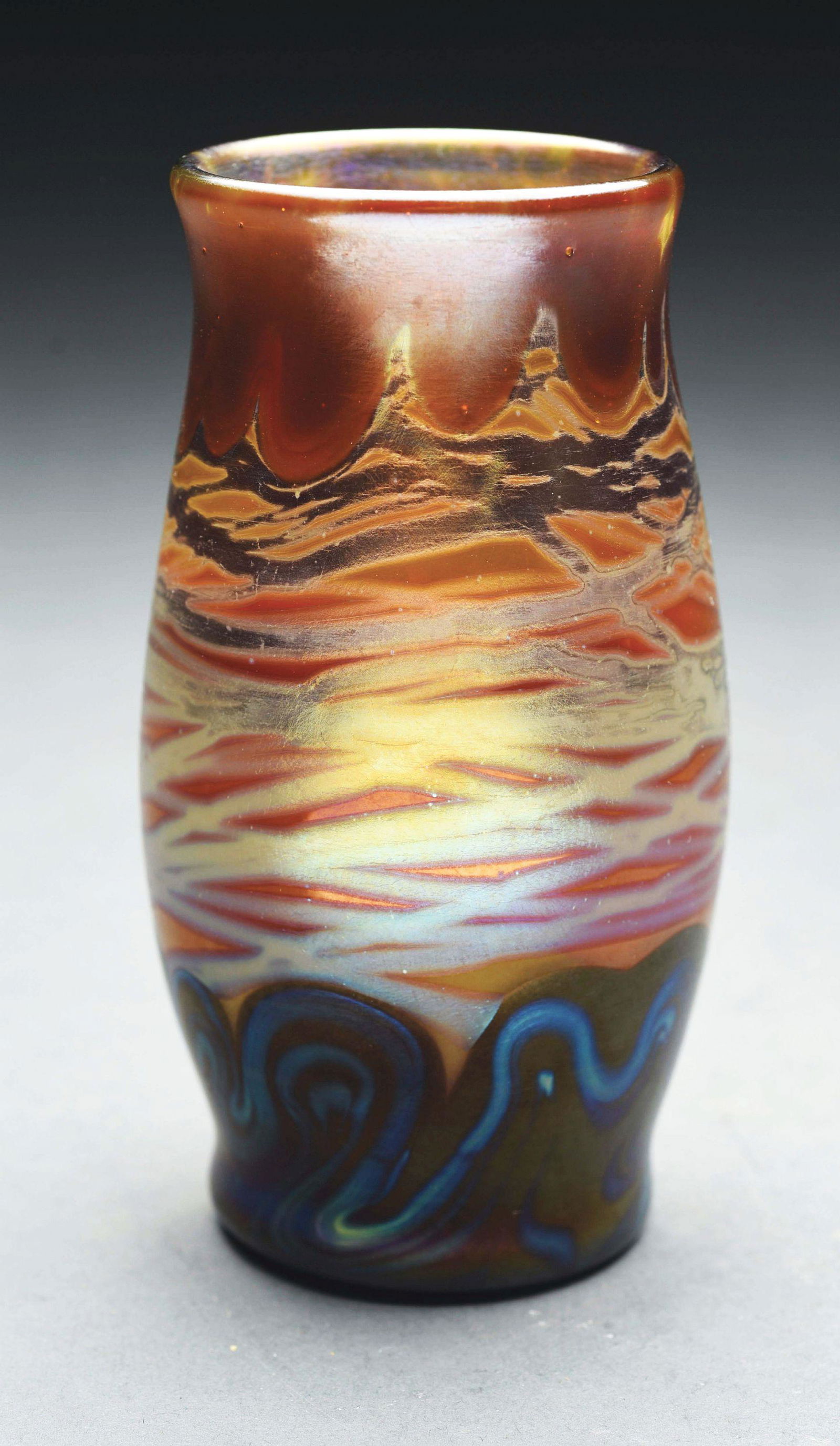 AUSTRIAN ART NOUVEAU STYLE OF LOETZ VASE.: An Austrian Art Nouveau iridescent decorated vase. The vase is the Style of Loetz. The vase is unsigned. Condition: (Excellent). Dimensions: 6" T x 3" D.