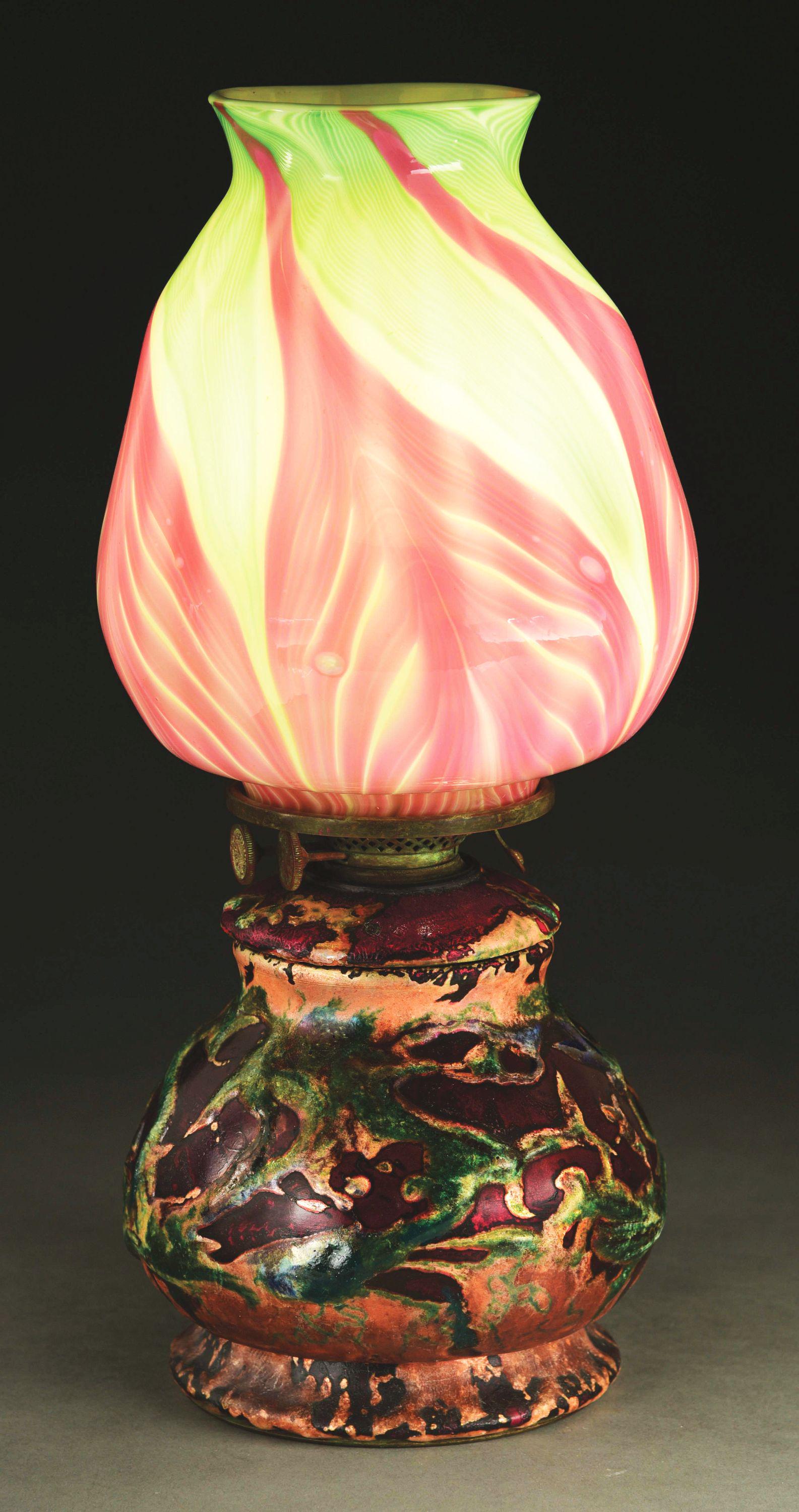 TIFFANY STUDIOS EARLY ENAMELED TABLE LAMP.: An extremely rare and early Tiffany Studios “Enameled” lamp decorated with a very large and early Tiffany Favrile pulled feather decorated shade a top a early copper and enameled decorated Tiffany