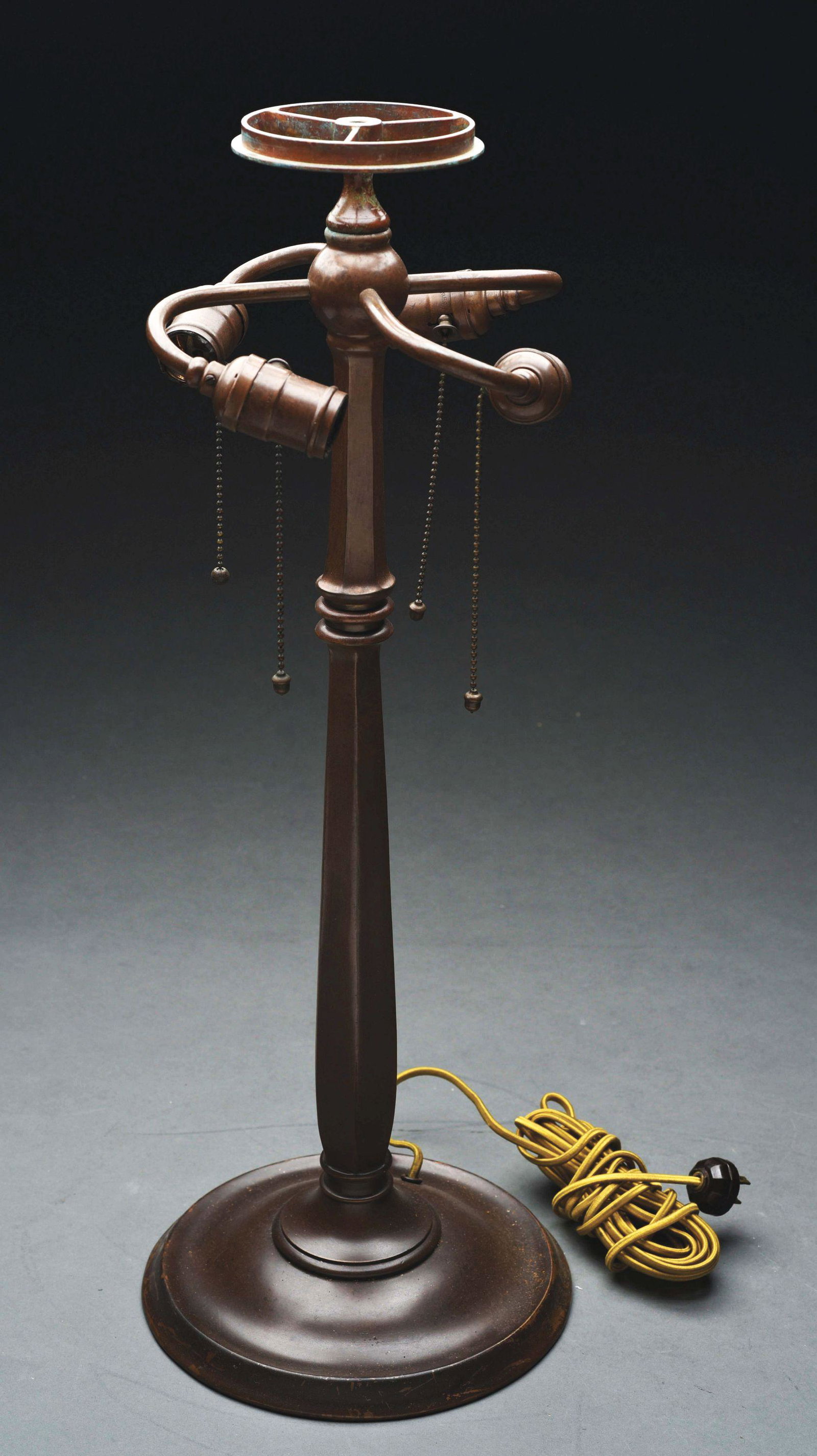 TIFFANY STUDIOS 532 BRONZE LAMP BASE.: Three-socket base, stamped "Tiffany Studios New York 532" under base. Nice finish. 8" Dia., 22" T overall. Condition: (Excellent). Dimensions: 25 - 1/4" x 10" x 10".