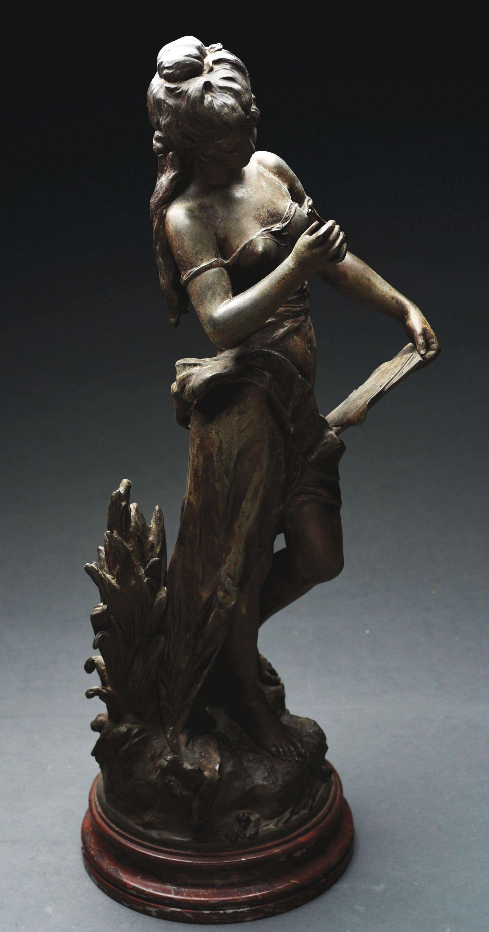 AUGUSTE MOREAU (FRANCE 1834 - 1917) ART NOUVEAU BRONZE: Bronze statue of a young girl holding tablet and writing instrument in a flowing dress. Auguste Moreau was born in Paris in 1834, the youngest son of sculptor and painter Jean-Baptiste Moreau. He stud
