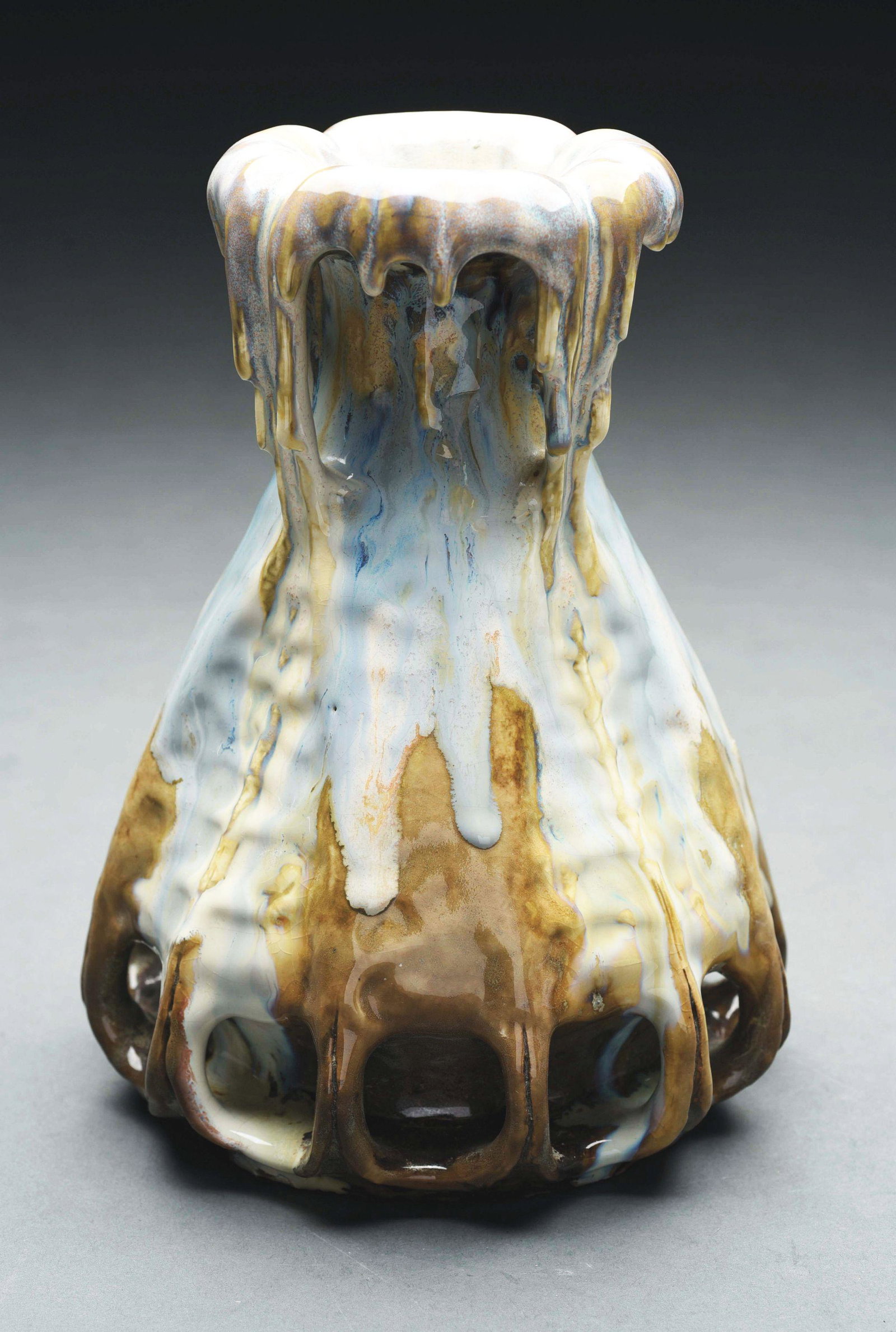 AMPHORA EDDA VASE.: Drip Glaze Edda Vase with thick application of pastel colored glazes running down body of vase like melted ice cream. Superb example of this glaze application on this interesting form. Raised Edda mar