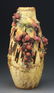 AMPHORA LIGHTING BOLT VASE WITH APPLIED BERRIES.