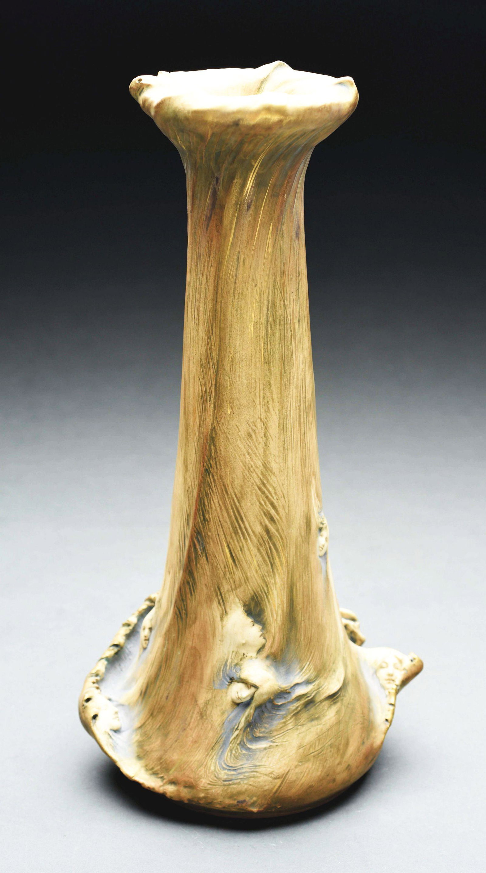AMPHORA MONUMENTAL FATES VASE.: Raised Sirens swirling in the wind around the vase. Cream and reddish brown glazes with hints of gold gilt. Raised Amphora mark, remnants RSTK, impressed “3743/26" . 17" high. A similar model is ill
