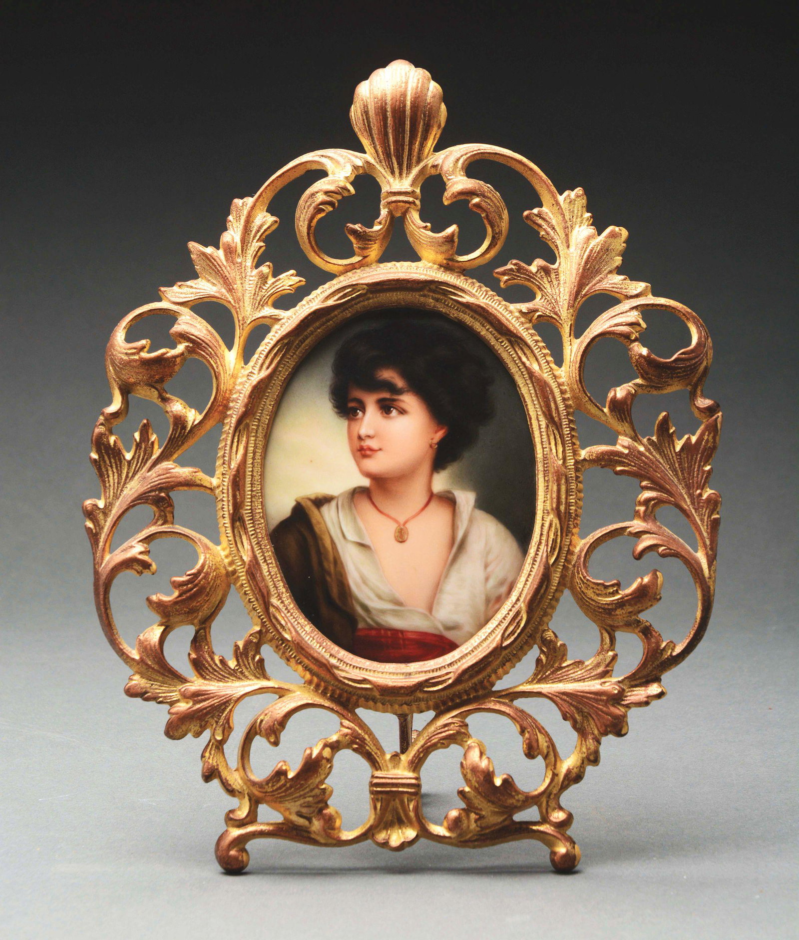 FRAMED HAND PAINTED PORCELAIN PLAQUE.: Plaque is signed "WAGNER", and the back of the porcelain is signed "NEAPOLITANER". The plaque measures 5" x 4", and is in a brass frame which is 11" tall. Condition: (Excellent). Dimensions: 11" x 8 -
