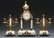 THREE PIECE FRENCH ONYX AND GILT METAL CLOCK SET.