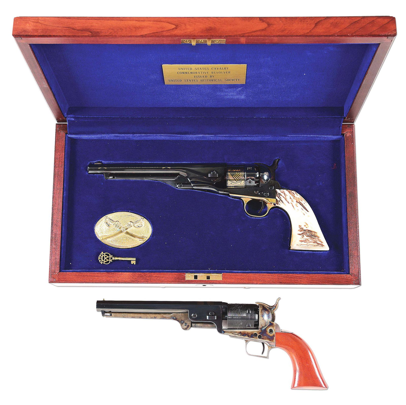 (A) LOT OF 2: COLT PERCUSSION REVOLVERS WITH CASES.: Lot consists of: (A) Features include percussion single action revolver with gold enhancements. United States Cavalry commemorative. Sambar stag grips. CONDITION: Gun retains 99% of the factory applie