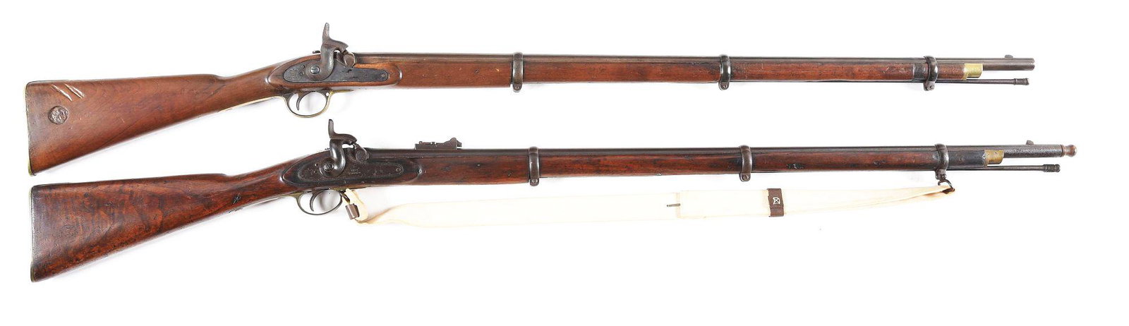 (A) LOT OF 2: TOWER PERCUSSION RIFLES.: Lot consists of: (A) British proofed smoothbore transition barreled Pattern of 1853 Enfield with fixed front sight. Tower marked lock with Barnett of London makers mark. Brass trigger guard and buttpl