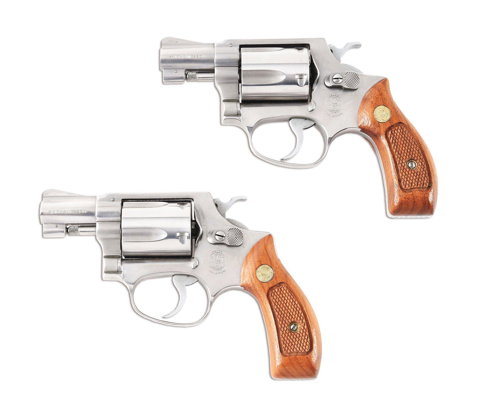 (M) LOT OF 2: CONSECUTIVE SERIAL NUMBER SMITH & WESSON: Lot consist of (A) Made in 1979-1980. The .38 Chief's Special Stainless. Built on a round butt J frame. Pinned barrel with a serrated ramp front sight. Double action with a 5 shot fluted cylinder and 