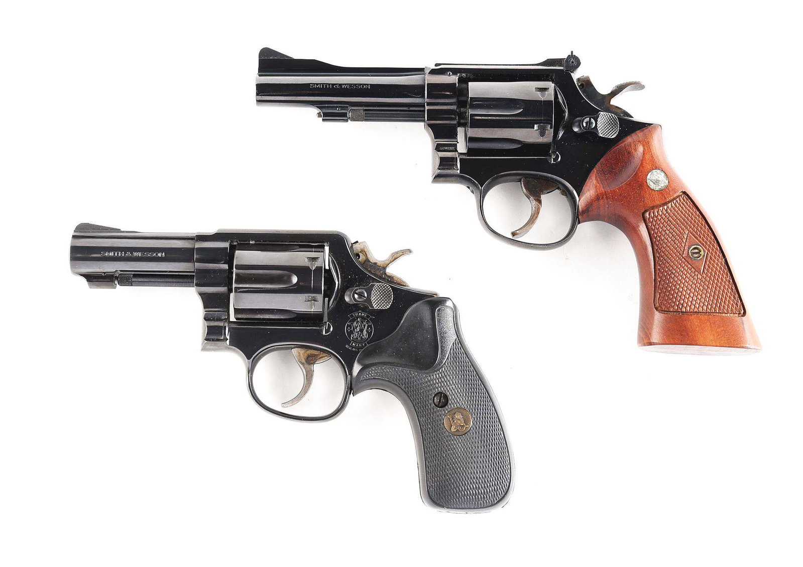 (C&M) LOT OF 2: SMITH AND WESSON 15 AND 13-4 REVOLVERS.: Lot consists of (A) Target trigger, target hammer and target grips. Pinned and recessed barrel. Micrometer click rear sight. Magna large diamond grips. 6 shot cylinder. CONDITION: Gun retains 97% of t