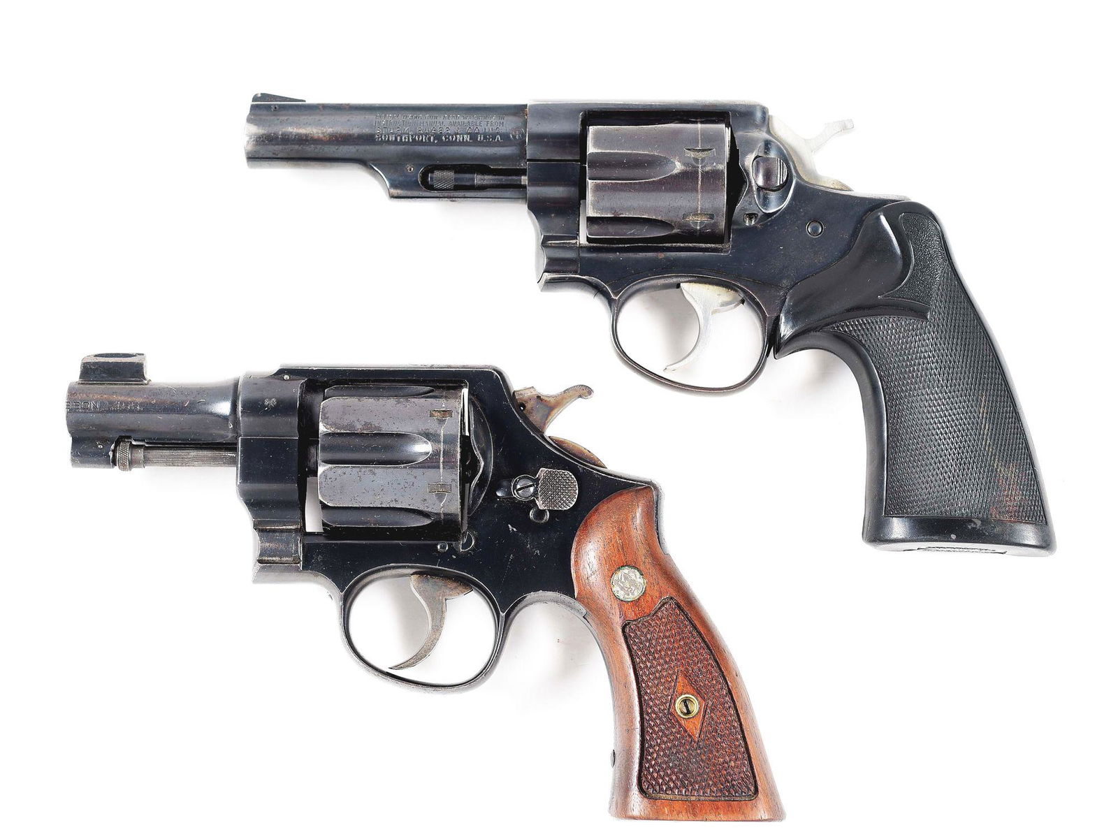 (M+C) LOT OF 2: RUGER SPEED SIX AND SMITH & WESSON .455: A) Ruger Speed Six, double action revolver. 4-inch barrel with pinned front blade front sight. Square notch rear sight. Chambered in .357 magnum. Full blue with replaced Pachmayr black rubber grips. C