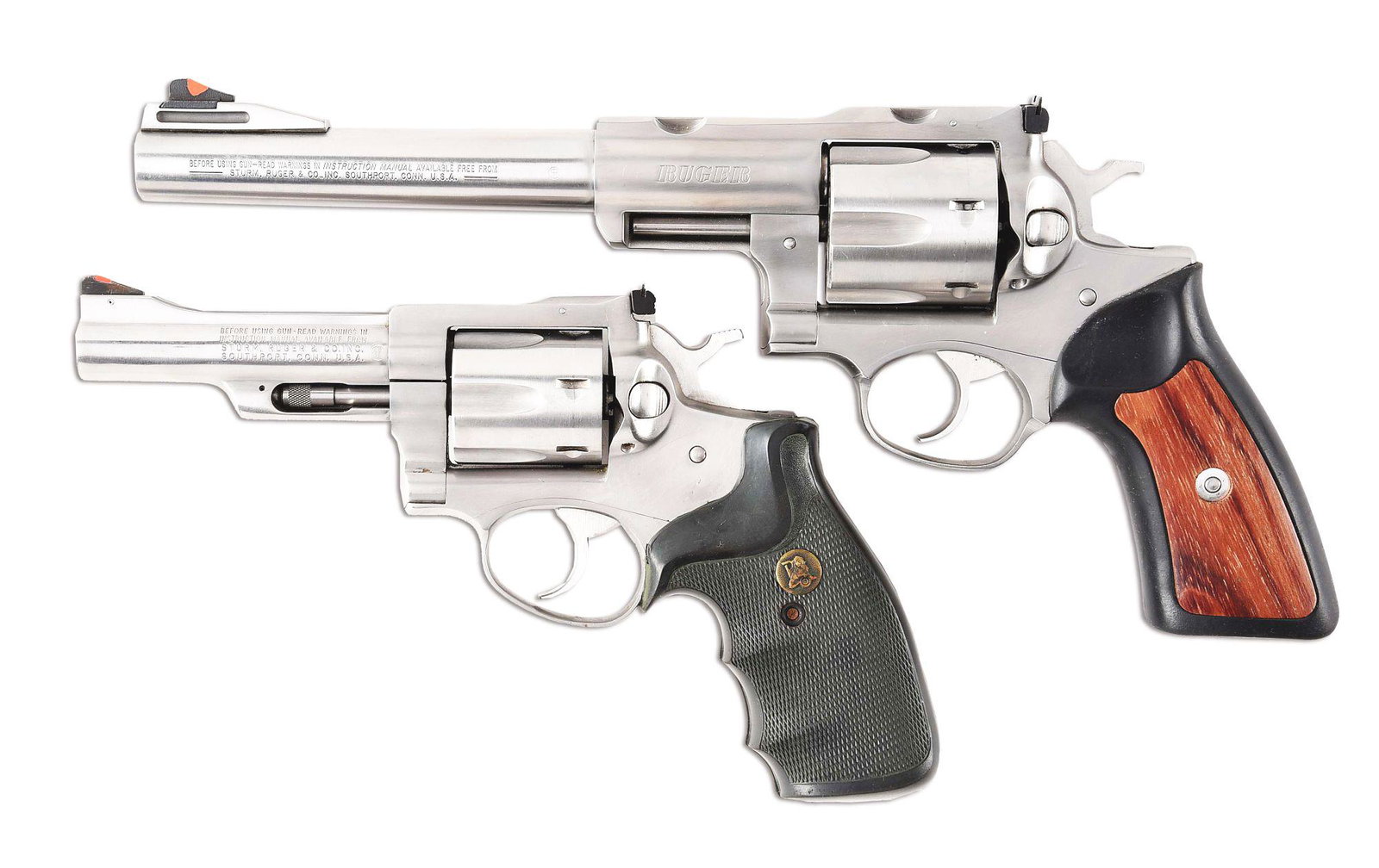 (M) LOT OF 2: RUGER SUPER REDHAWK AND SECURITY SIX: Stainless steel Ruger Redhawk. 7-1/2 inch barrel chambered in .44 magnum. Frame cut for scope rings. Red ramp front blade and adjustable square notch rear sights.Black rubber grips with wood panels. C