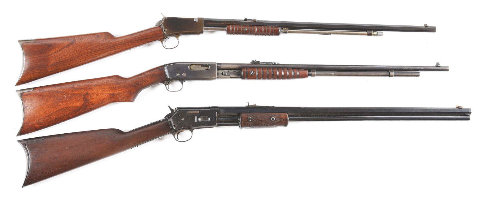 (C) LOT OF 3: WINCHESTER 1890, REMINGTON 25, AND COLT: A) 1910 Vintage Model 1890 Winchester slide action rifle. Chambered in .22 WRF. 24-inch octagon barrel. Nicely figured walnut stock and grooved forearm. Rifle style crescent buttplate. CONDITION: Fine