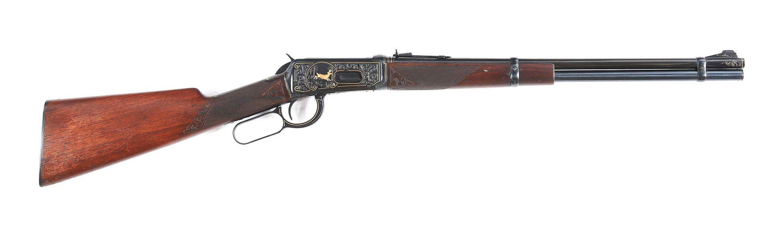 (C) WINCHESTER MODEL 1894 ENGRAVED LEVER-ACTION RIFLE: Winchester Model 94 Carbine made in 1940 and engraved by an unknown master engraver. Blued carbine style barrel with gold bands near breech and muzzle with floral engraving. Standard original sights. 