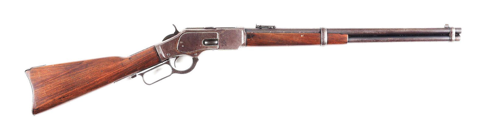 (C) WINCHESTER 1873 SADDLE RING CARBINE IN .44-40.: 1910 vintage Model 1873 Saddle Ring Carbine, serial number 634157B. 20" round barrel with full length magazine. Chambered in .44-40 WCF. Standard fold down ladder/elevator rear sight and small blade f