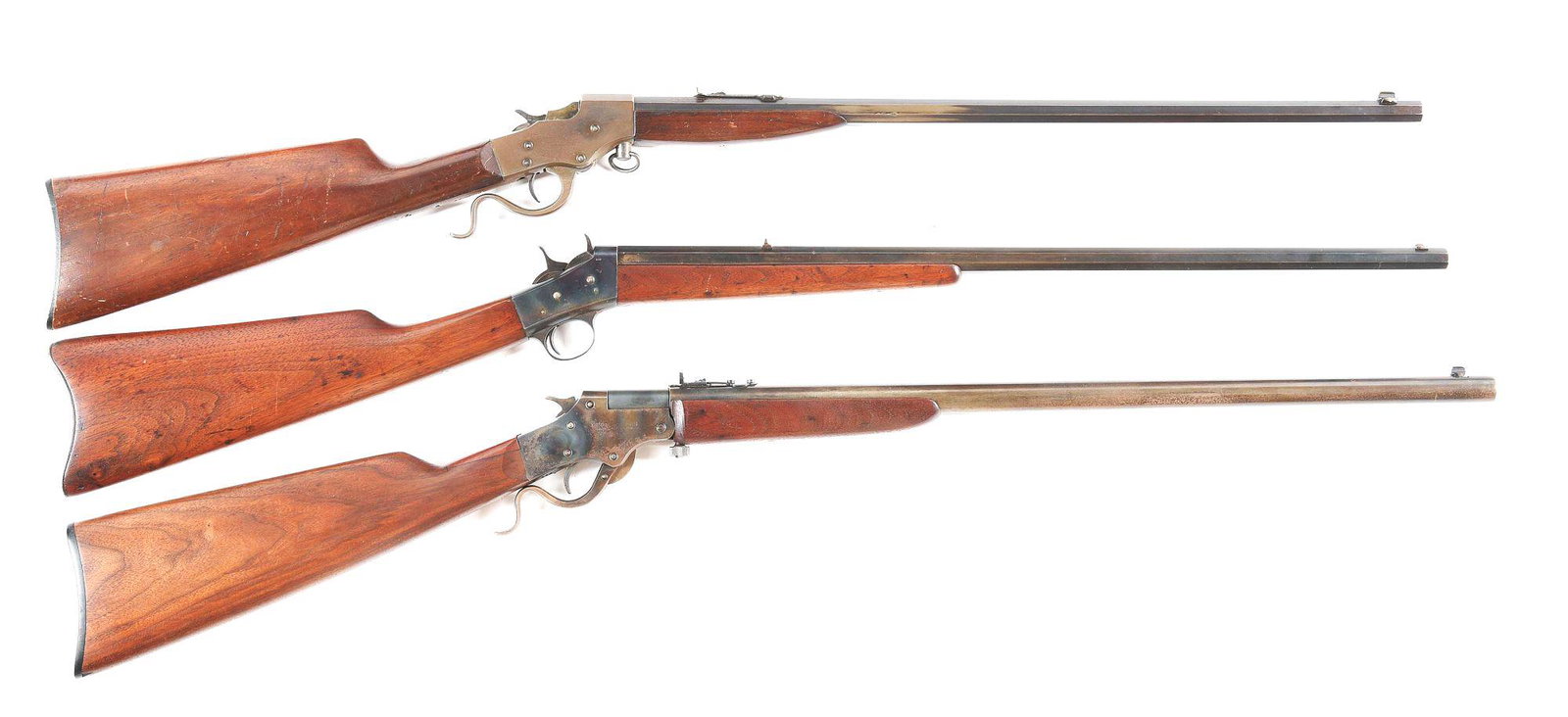 (C) LOT OF 3: STEVENS AND REMINGTON SINGLE SHOT RIFLES.: A) Stevens "Favorite" take-down single shot rifle. 24-inch octagon barrel chambered in .32 Long. Plain straight grain walnut stock and forearm. CONDITION: Fine overall with 80-90% original blue on bar